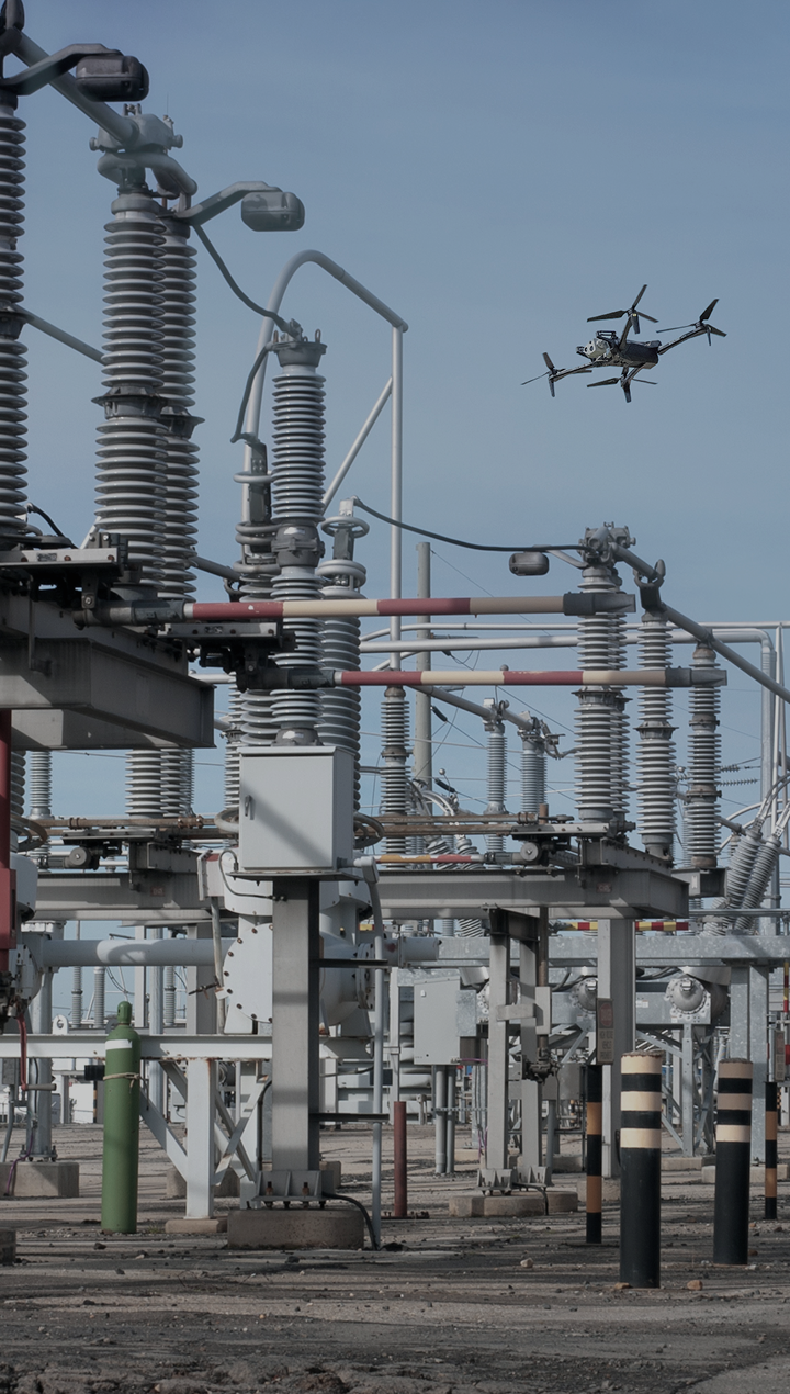 Skydio X10 drone flying over a transformer