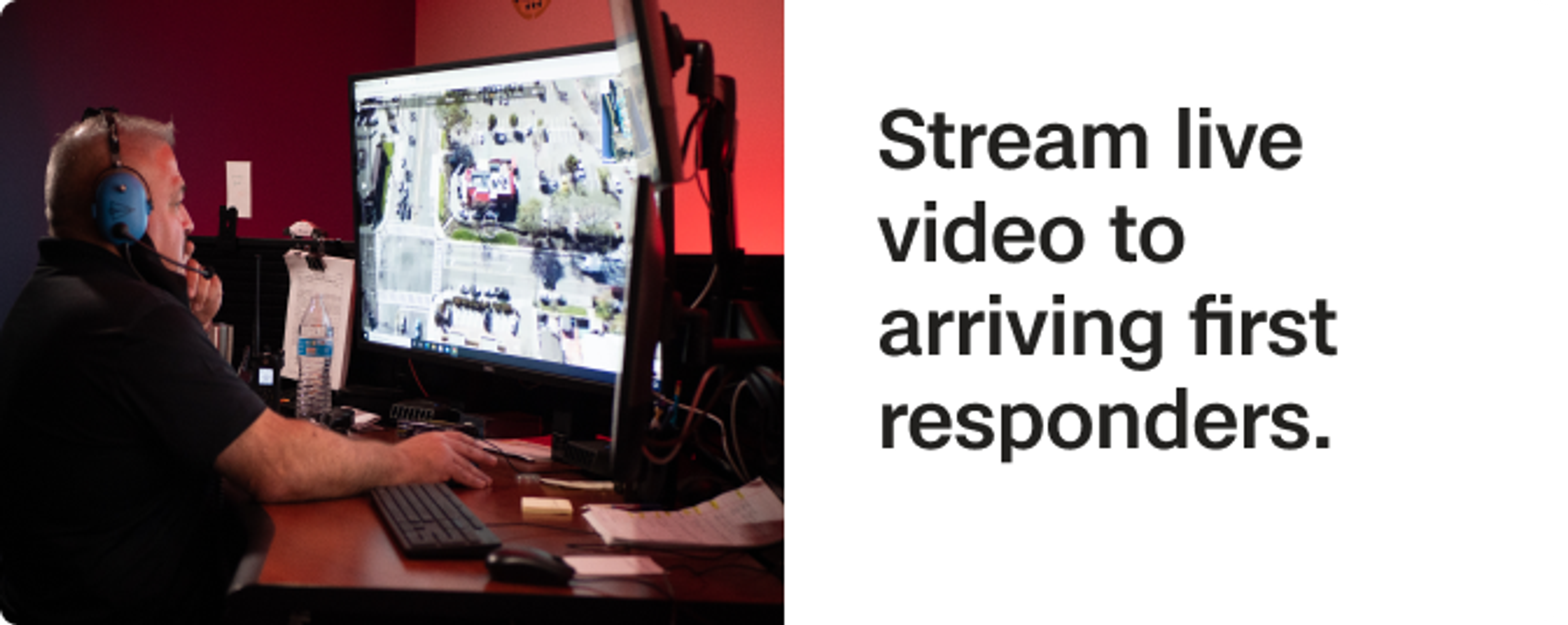man watching live stream from a Skydio public safety drone arriving on scene ahead of first responders
