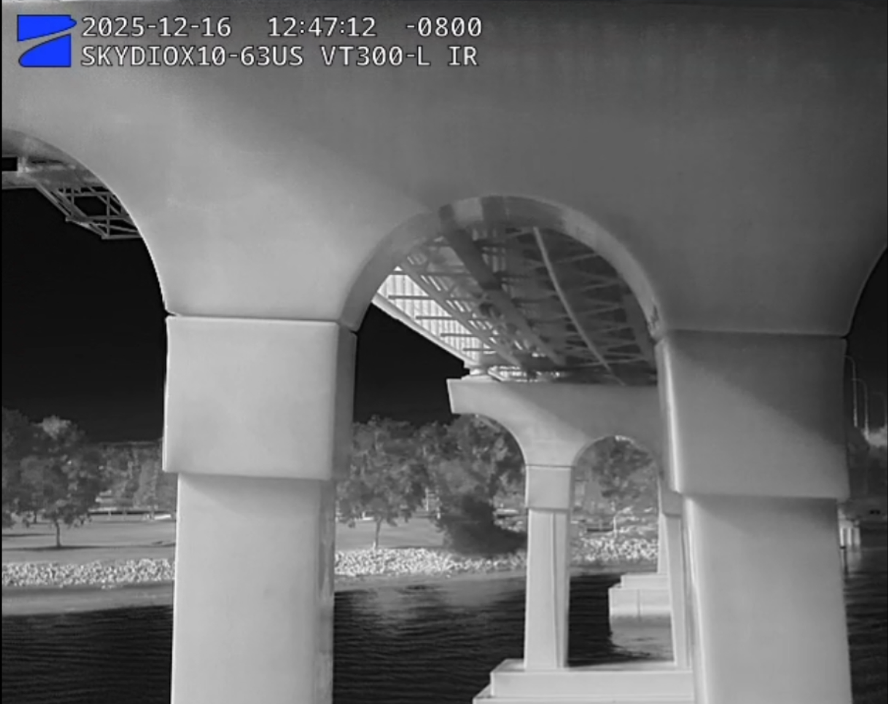 Thermal camera inspecting bridge at night