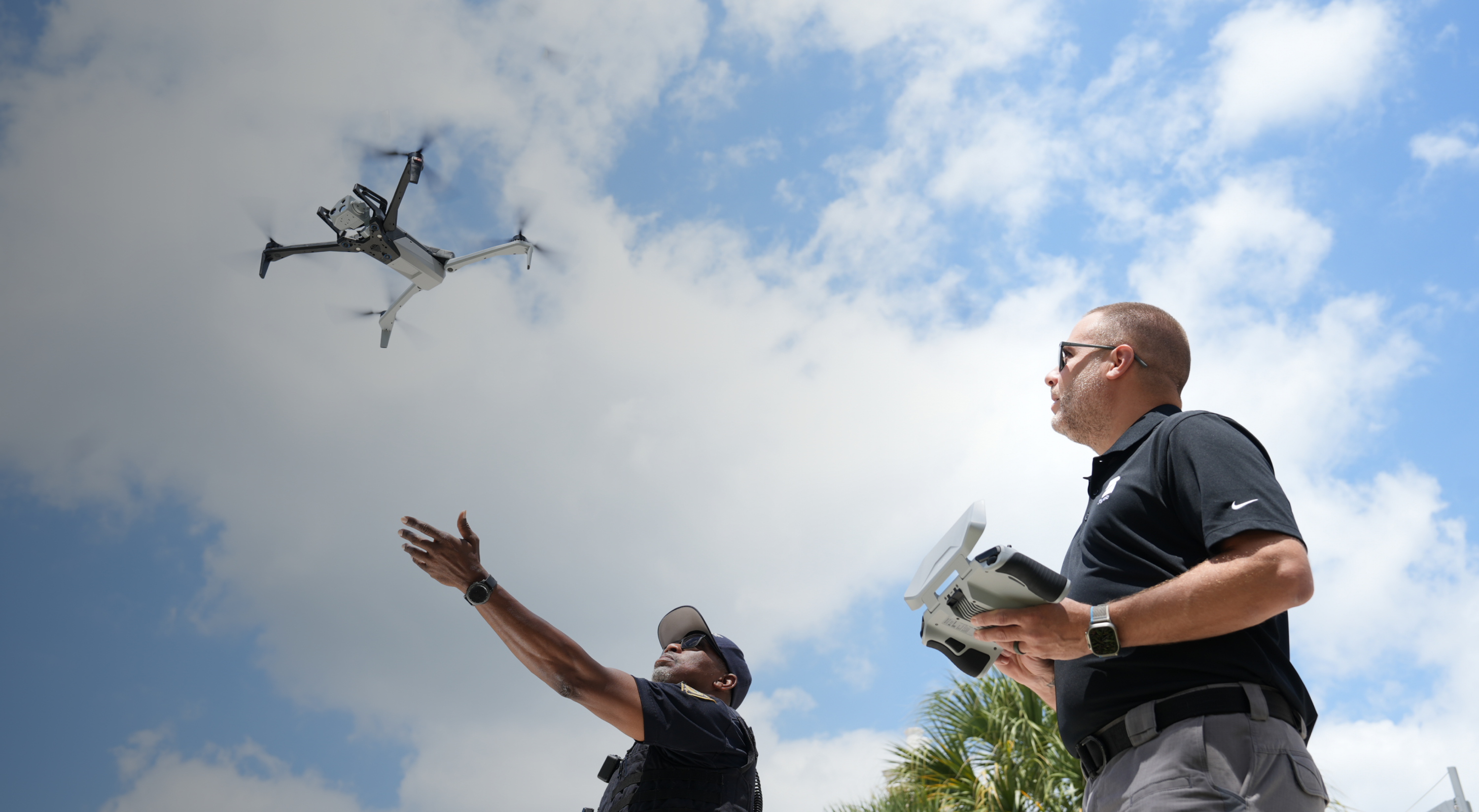 men flying Skydio X10 autonomous drone