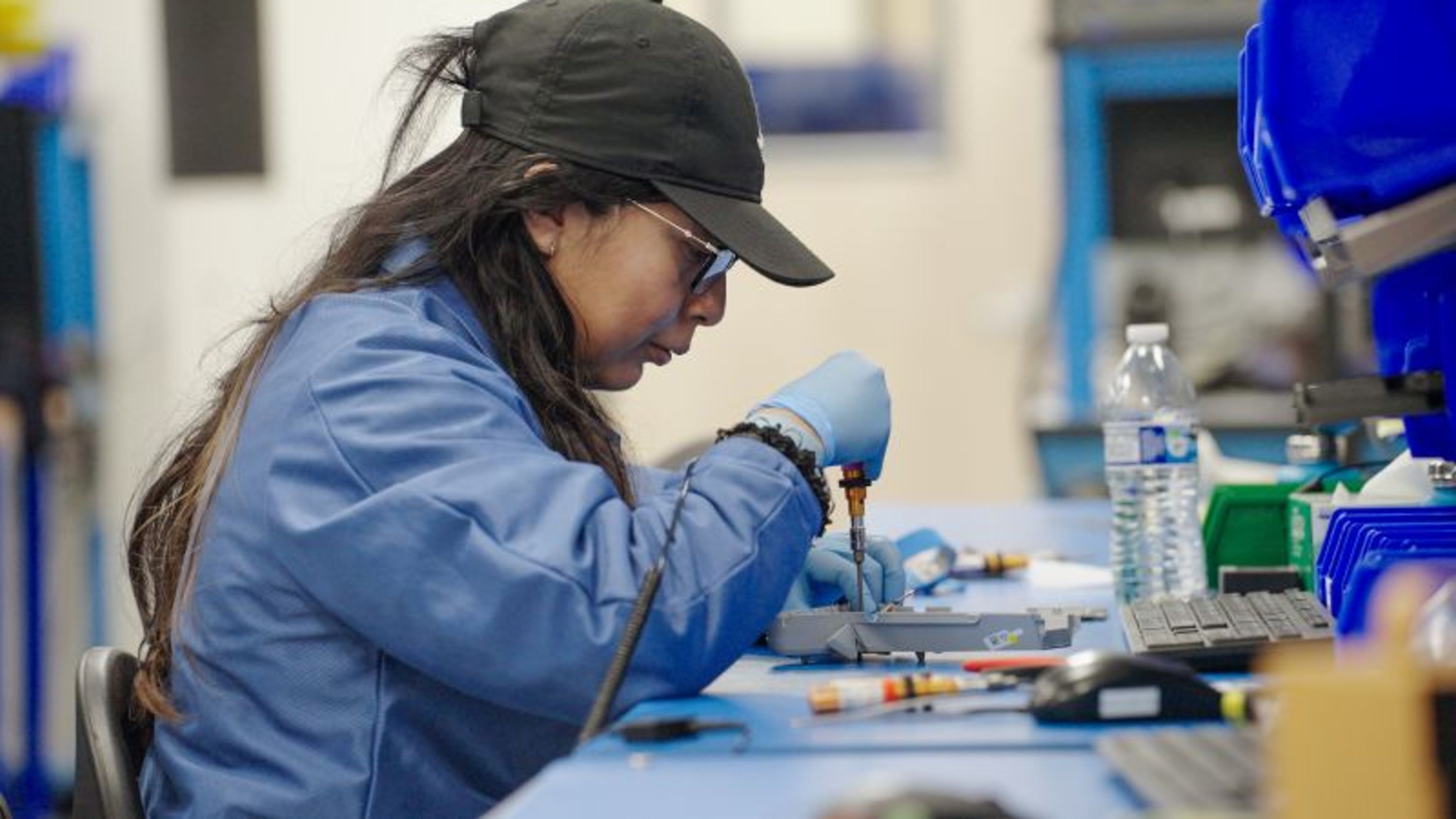 Technician building drones in Skydio US drone manufacturing plant in California