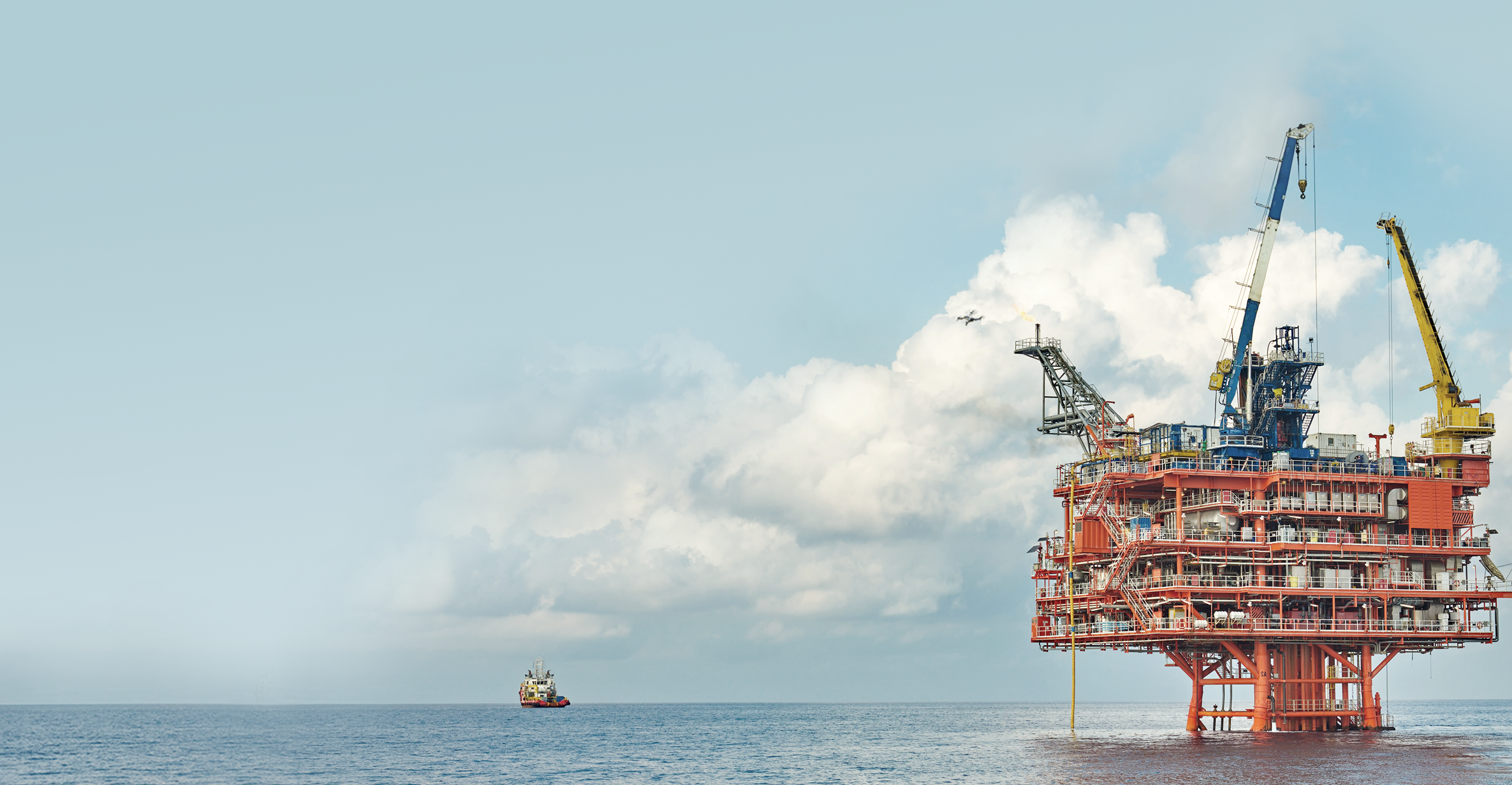 Skydio drone flying over an oil rig