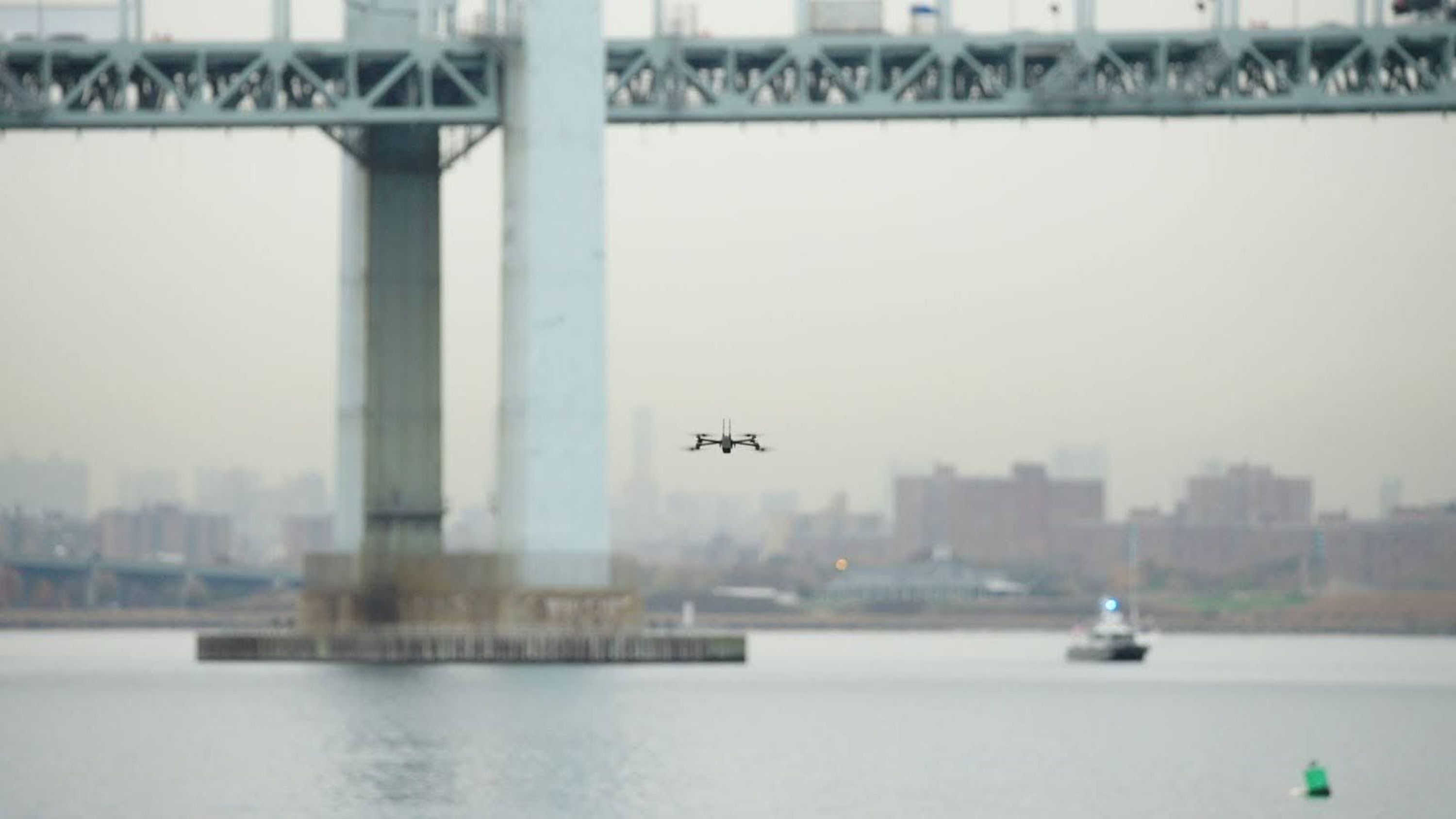 Skydio inspection drone at underside of the bridge