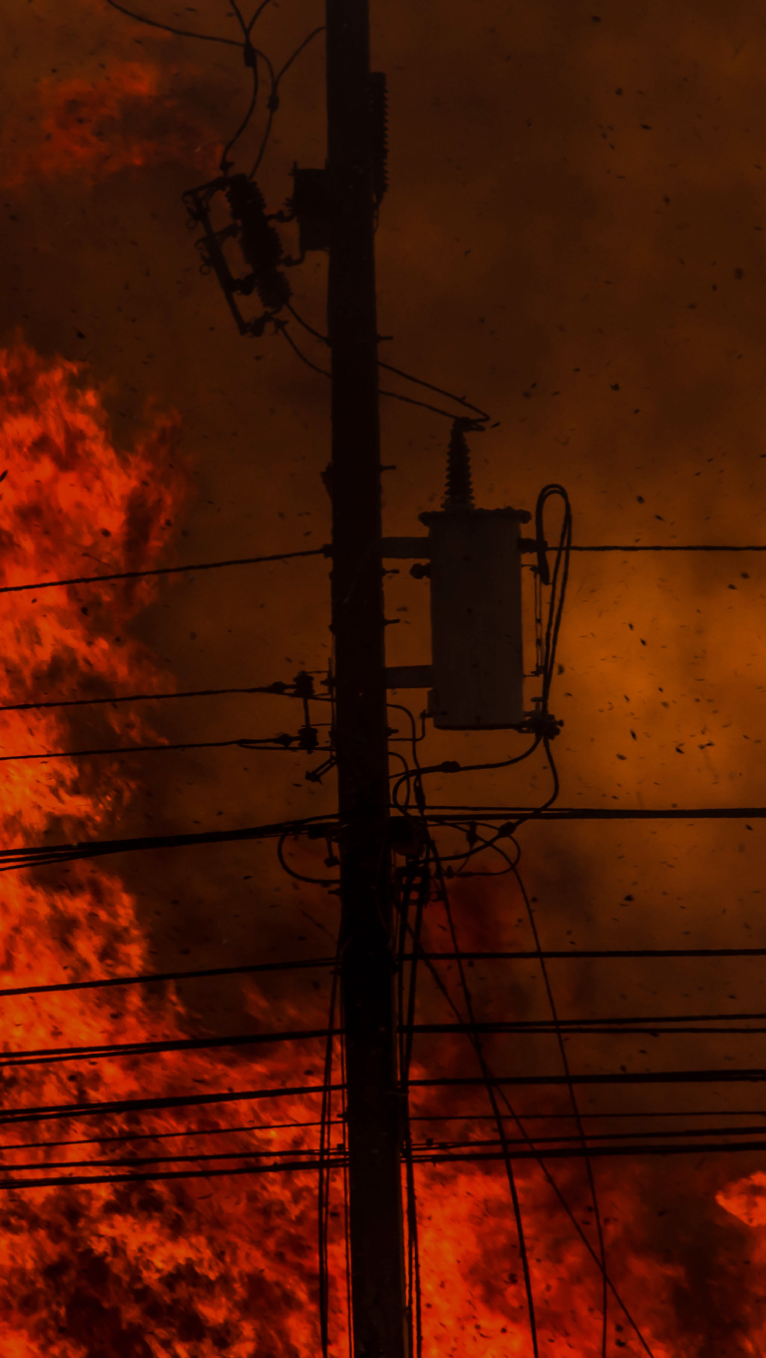 close image of wildfire near electrical assets