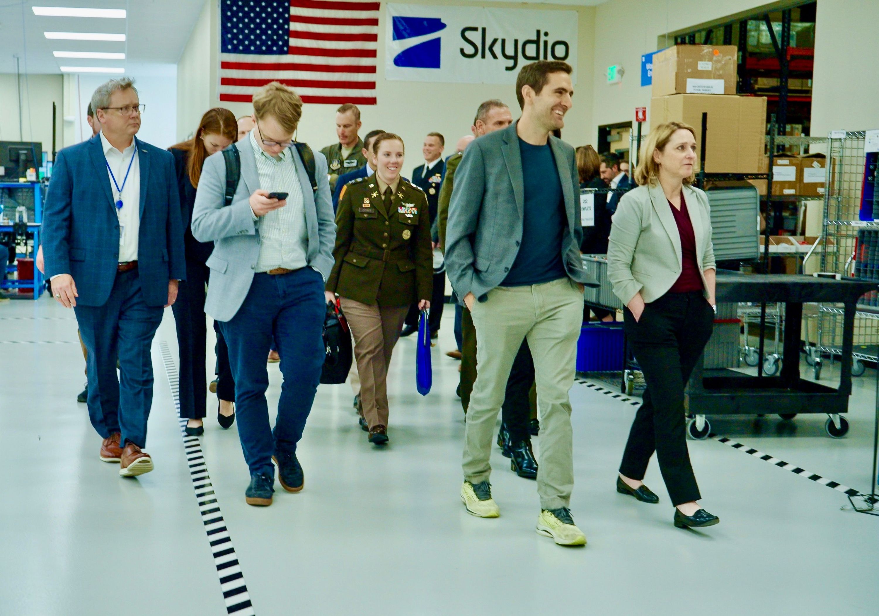 Skydio CEO Adam Bry with Deputy Secretary of Defense Kathleen Hicks and team at Skydio US manufacturing facility in Hayward, CA