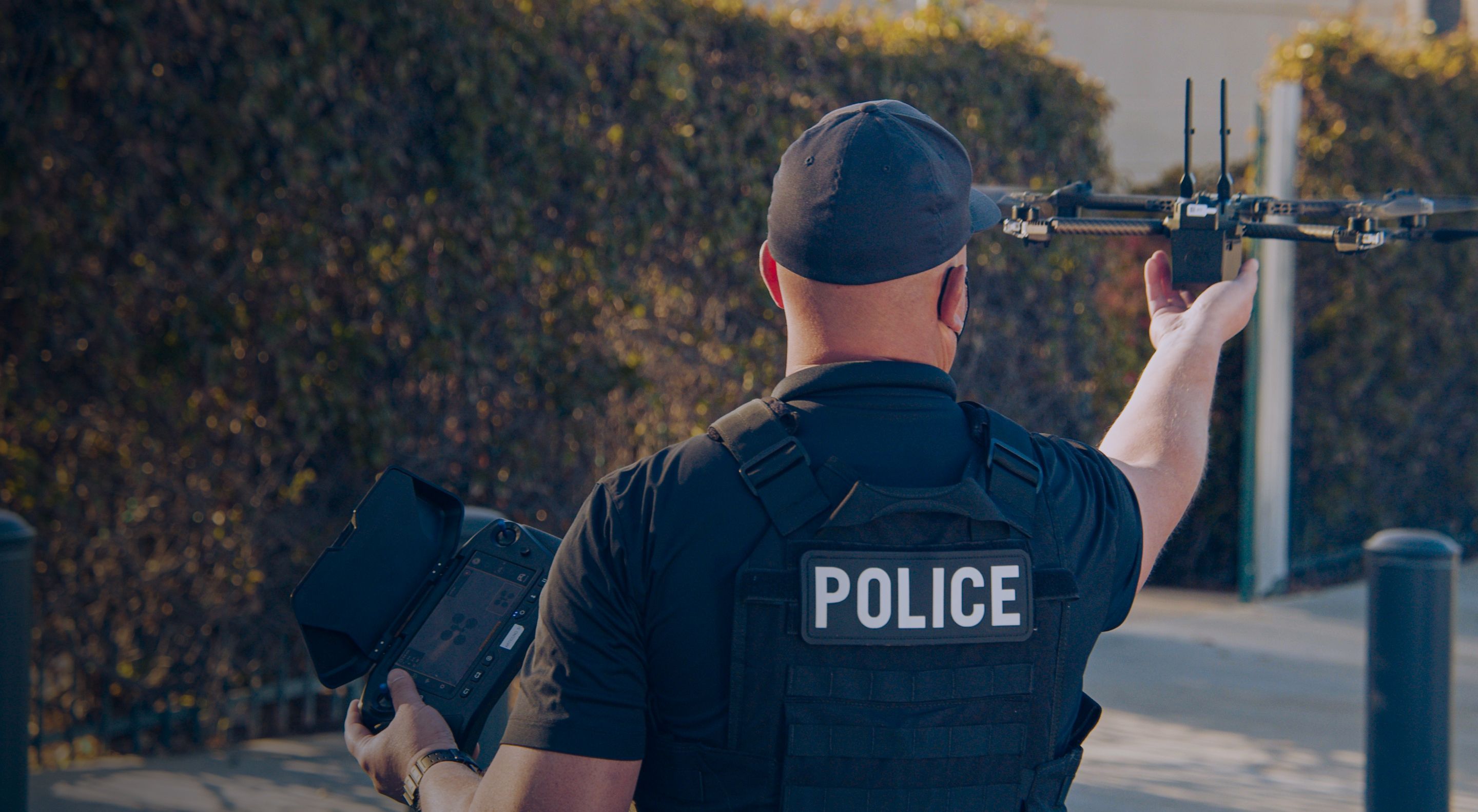 police officer hand launching a Skydio drone