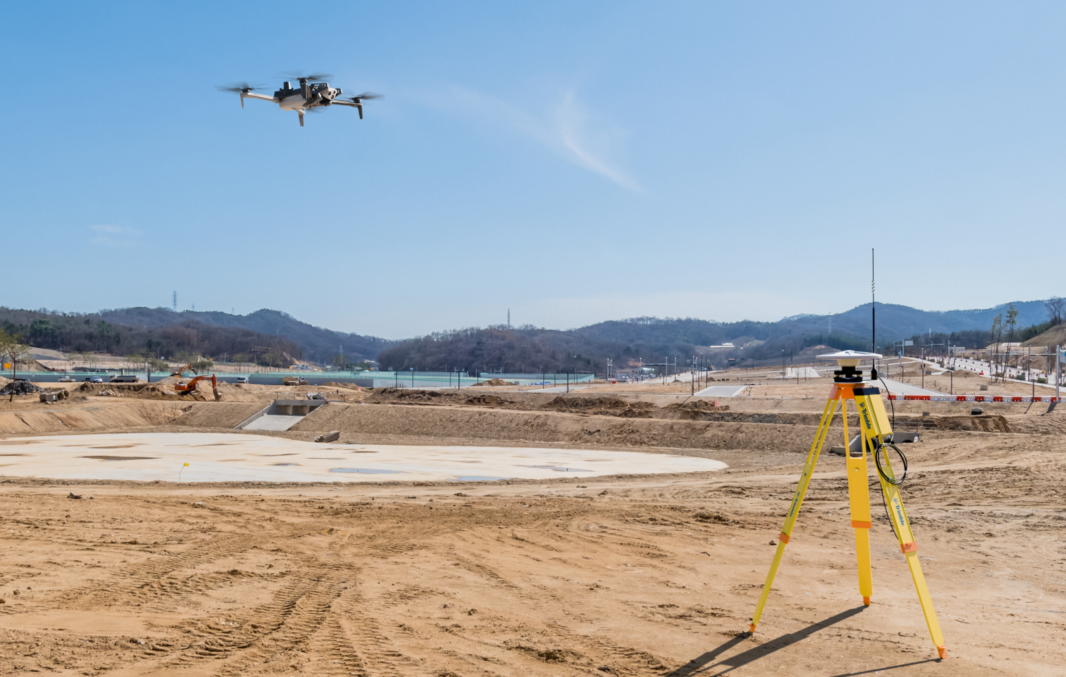 Skydio X10 mapping newly cleared construction site with RTK base stations