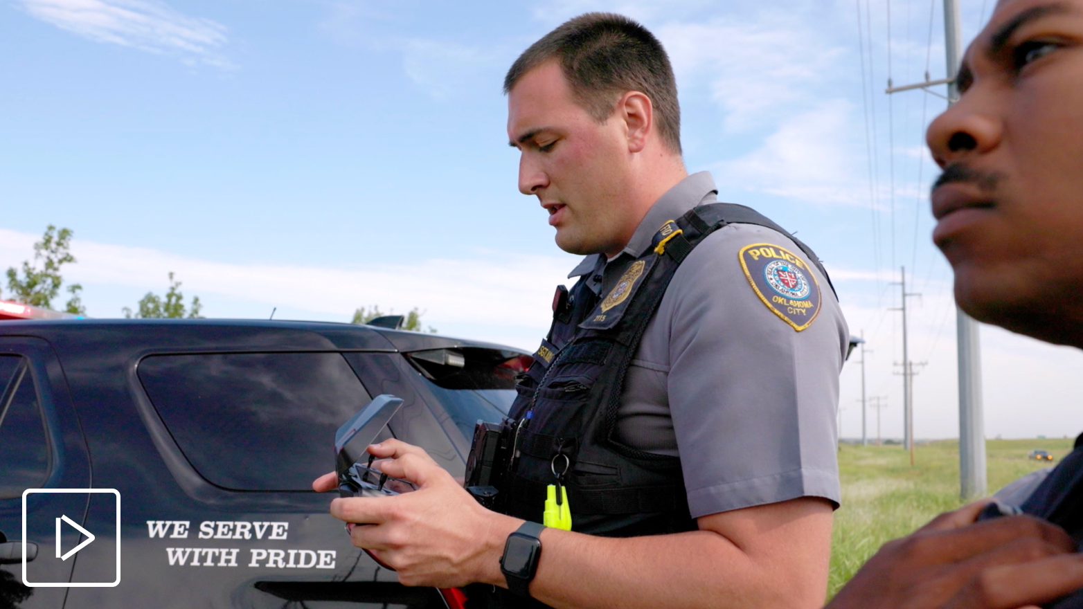Oklahoma City officer with Skydio drone controller in hand flying a Skydio police drone