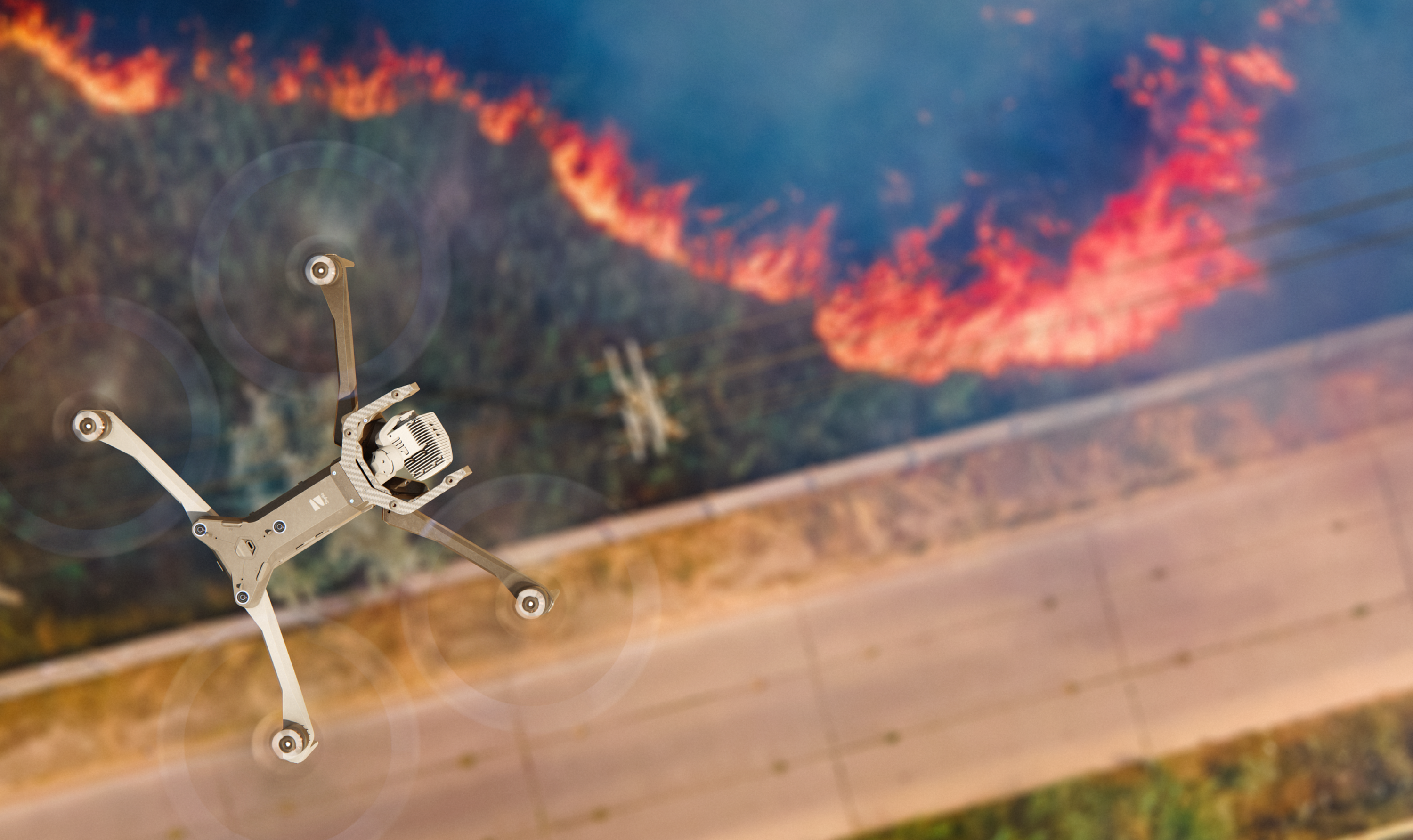 Drone surveying wildfire spread moving toward power distribution lines 
