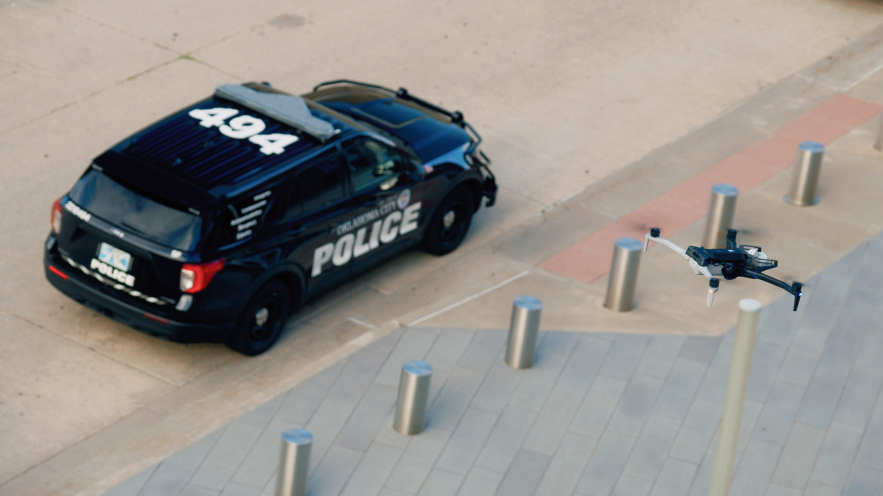 Oklahoma City Police vehicle with Skydio X10 police drone above