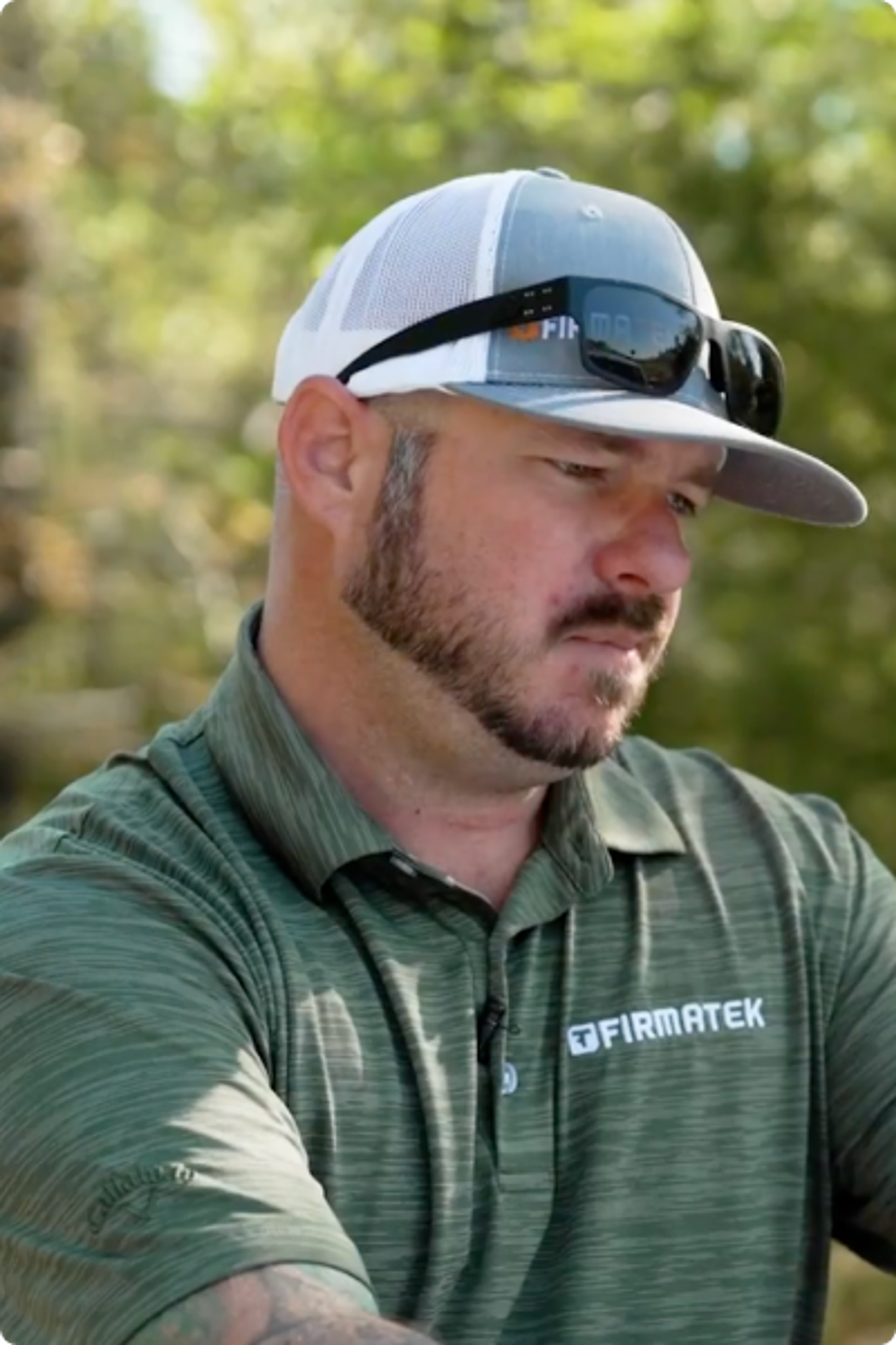 man in Firmatek polo shirt