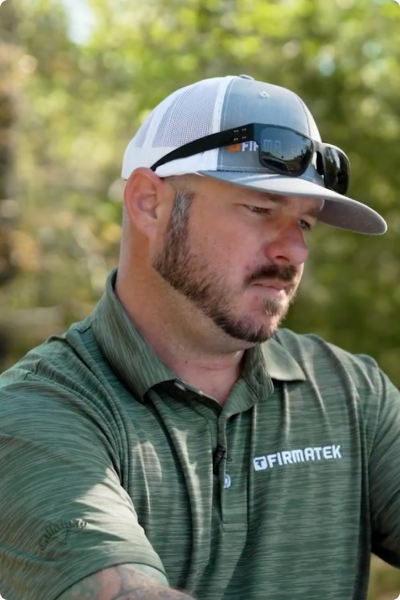 man in Firmatek polo shirt