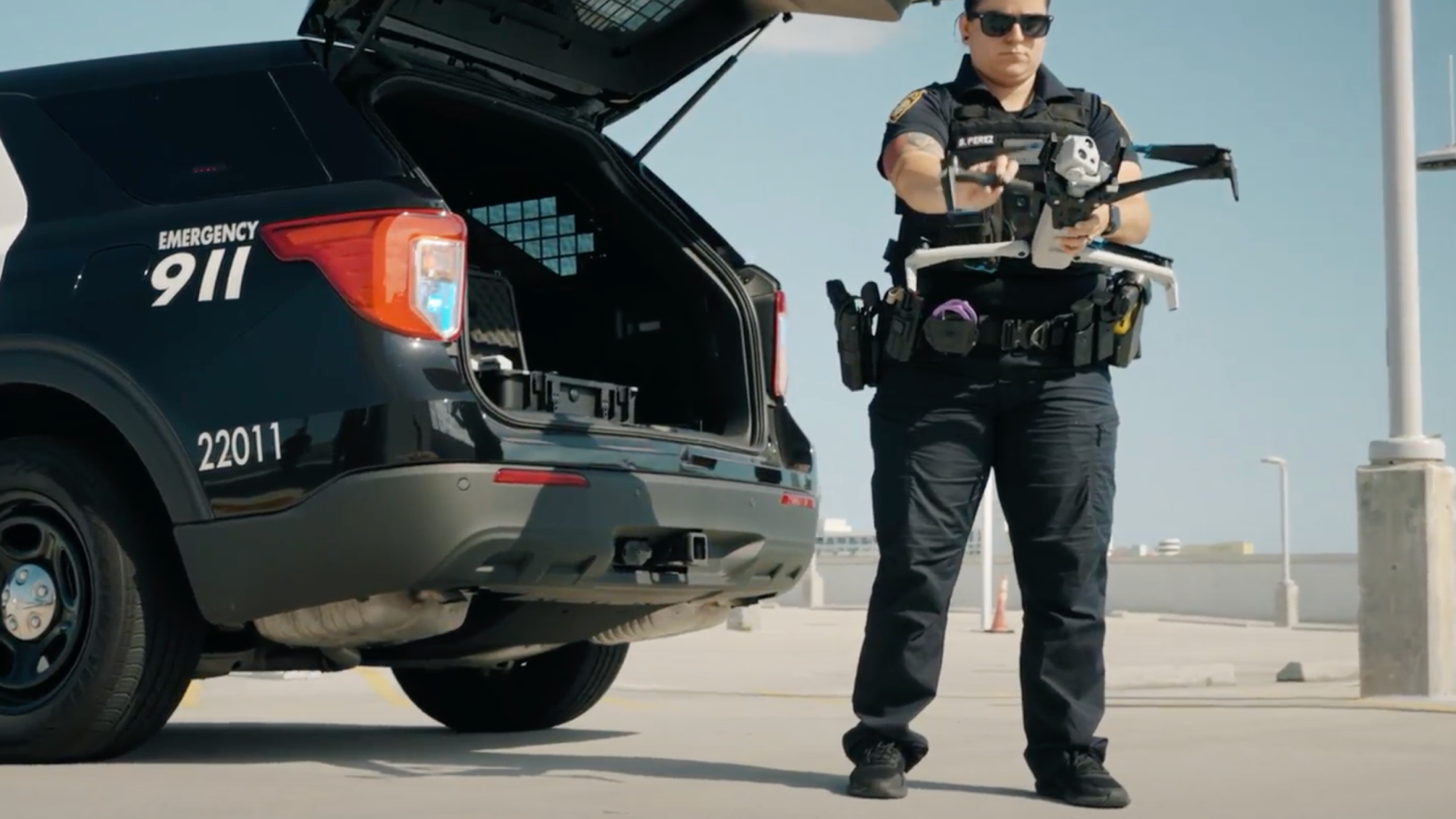 police officer holding a Skydio X10 police drone