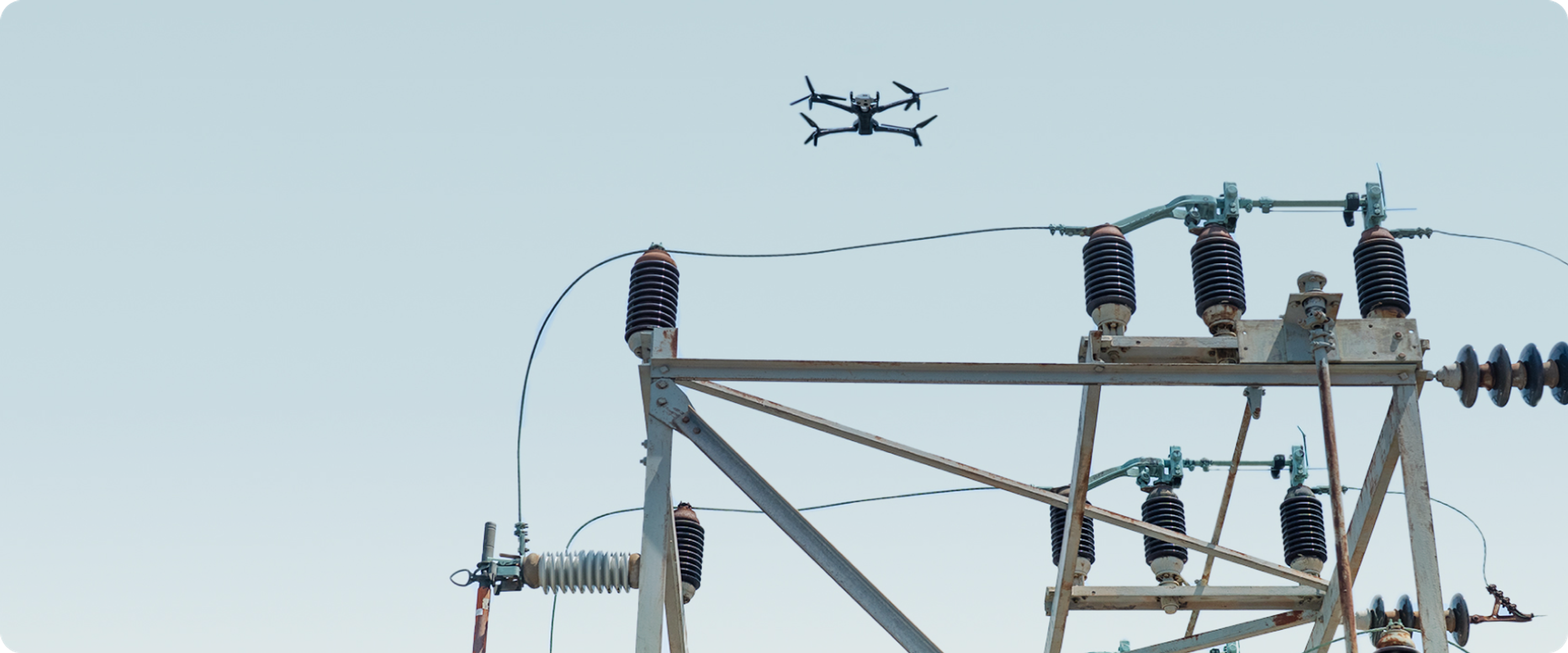 Skydio X10 inspection drone flying over a utility substation
