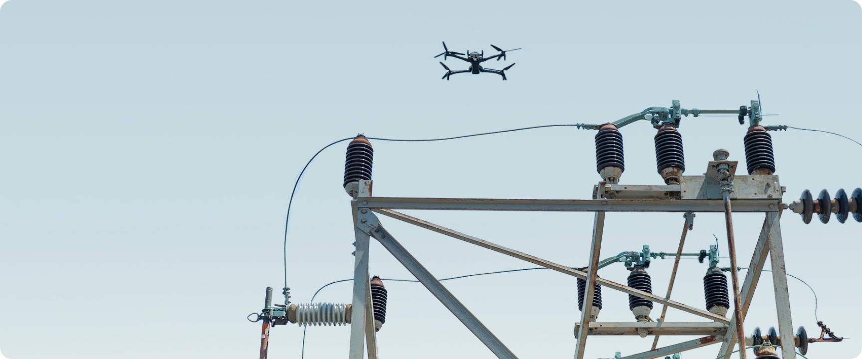 Skydio X10 inspection drone flying over a utility substation