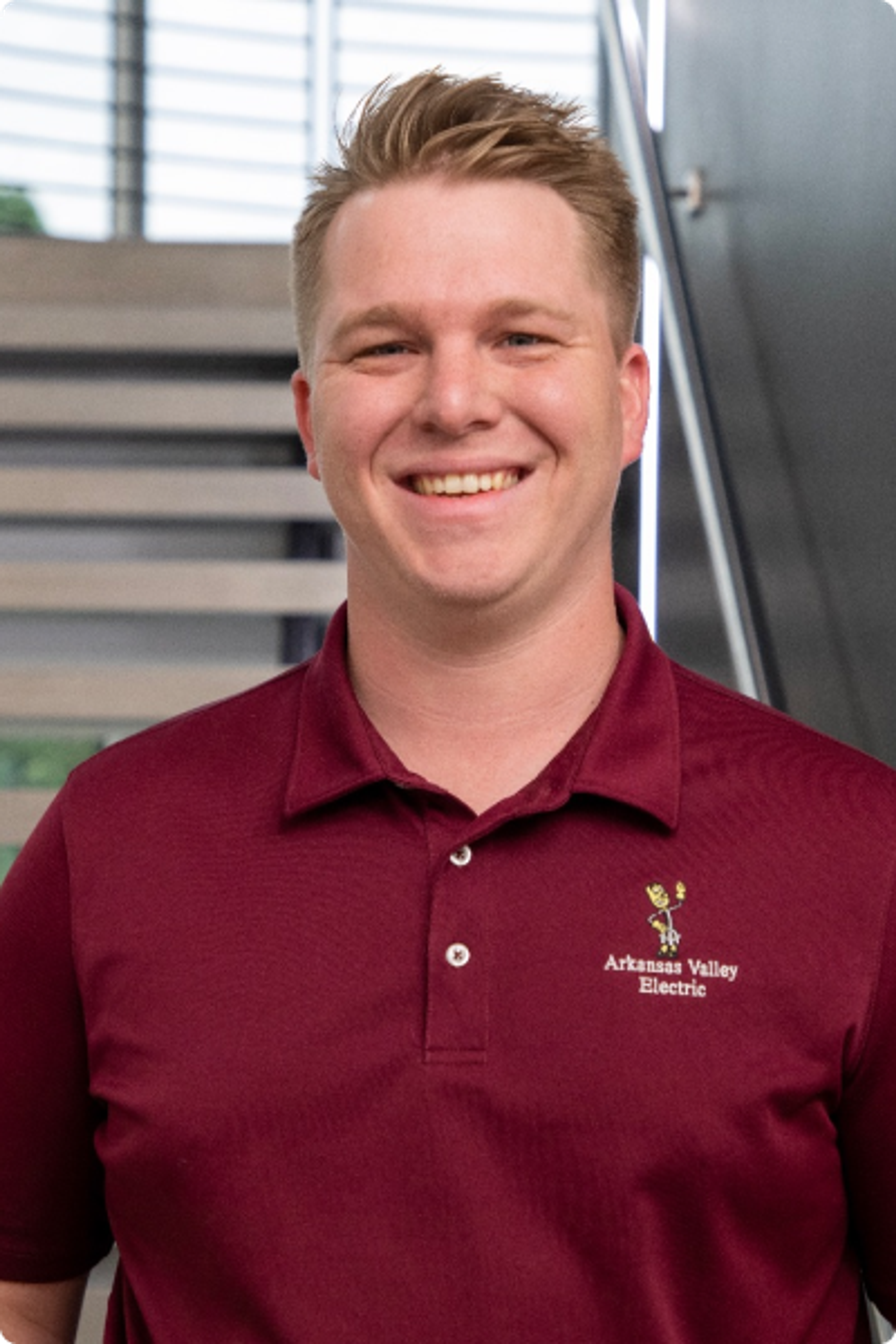 man in Arkansas Valley Electric polo