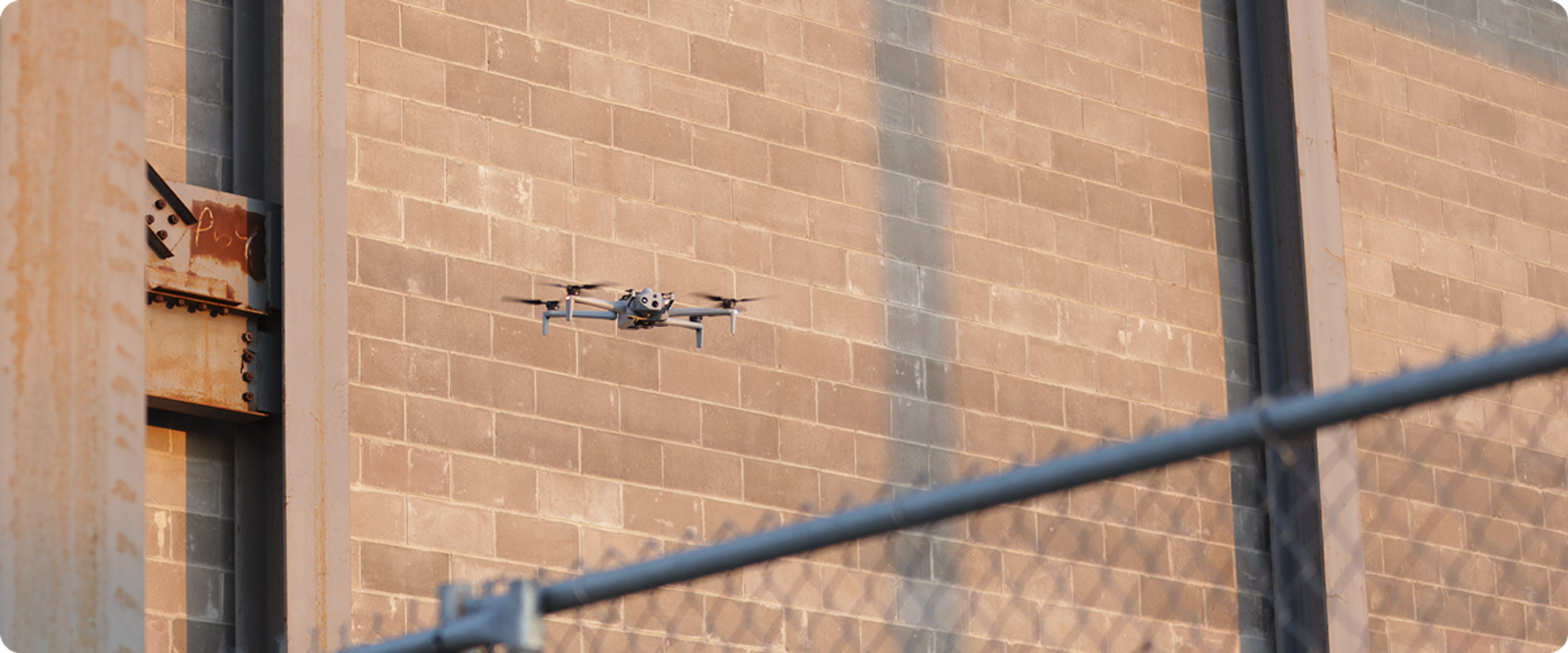Skydio X10 on autonomous patrol at fence line 