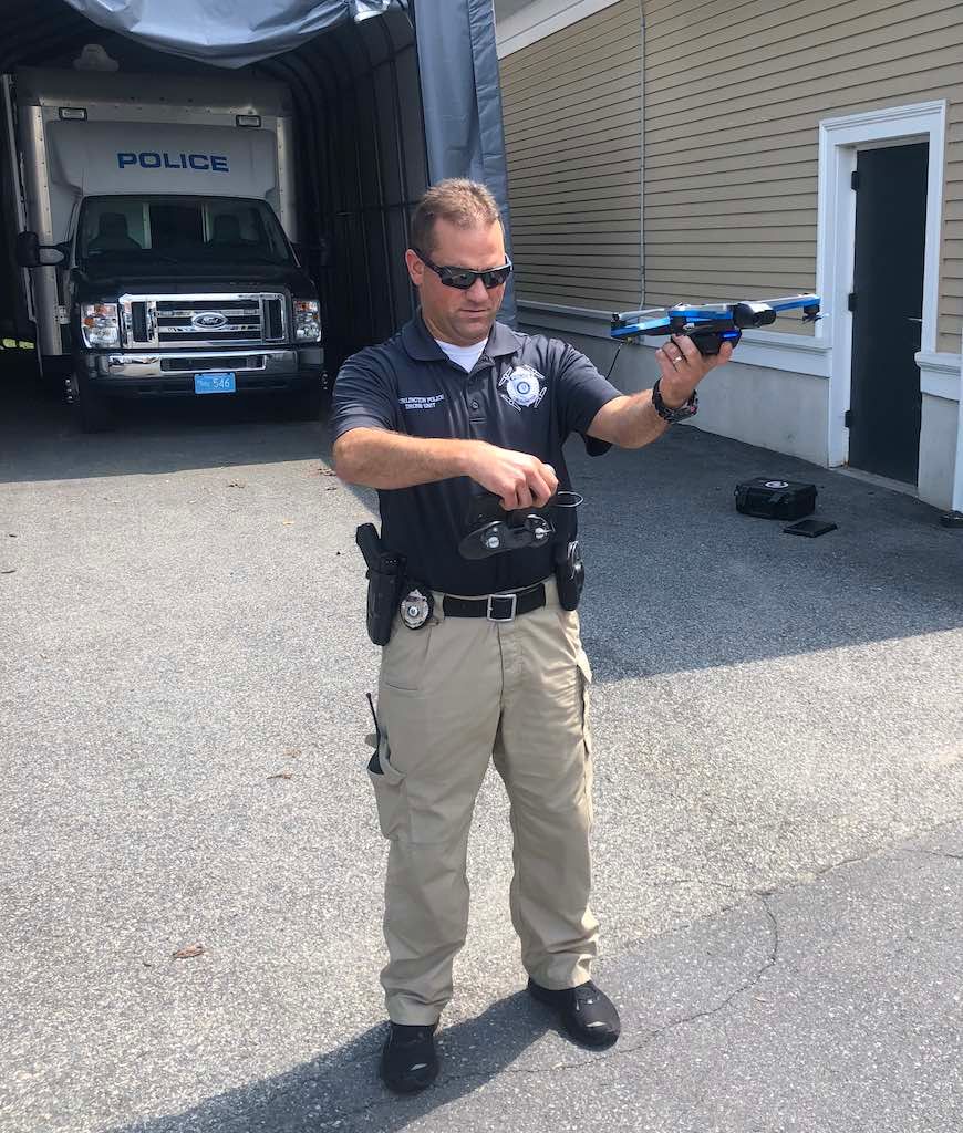 Officer launching autonomous drone