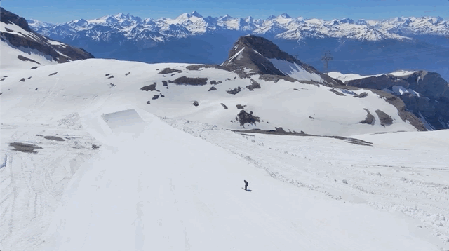 Frame the drone shot with a beautiful backdrop like sweeping mountains while skiing