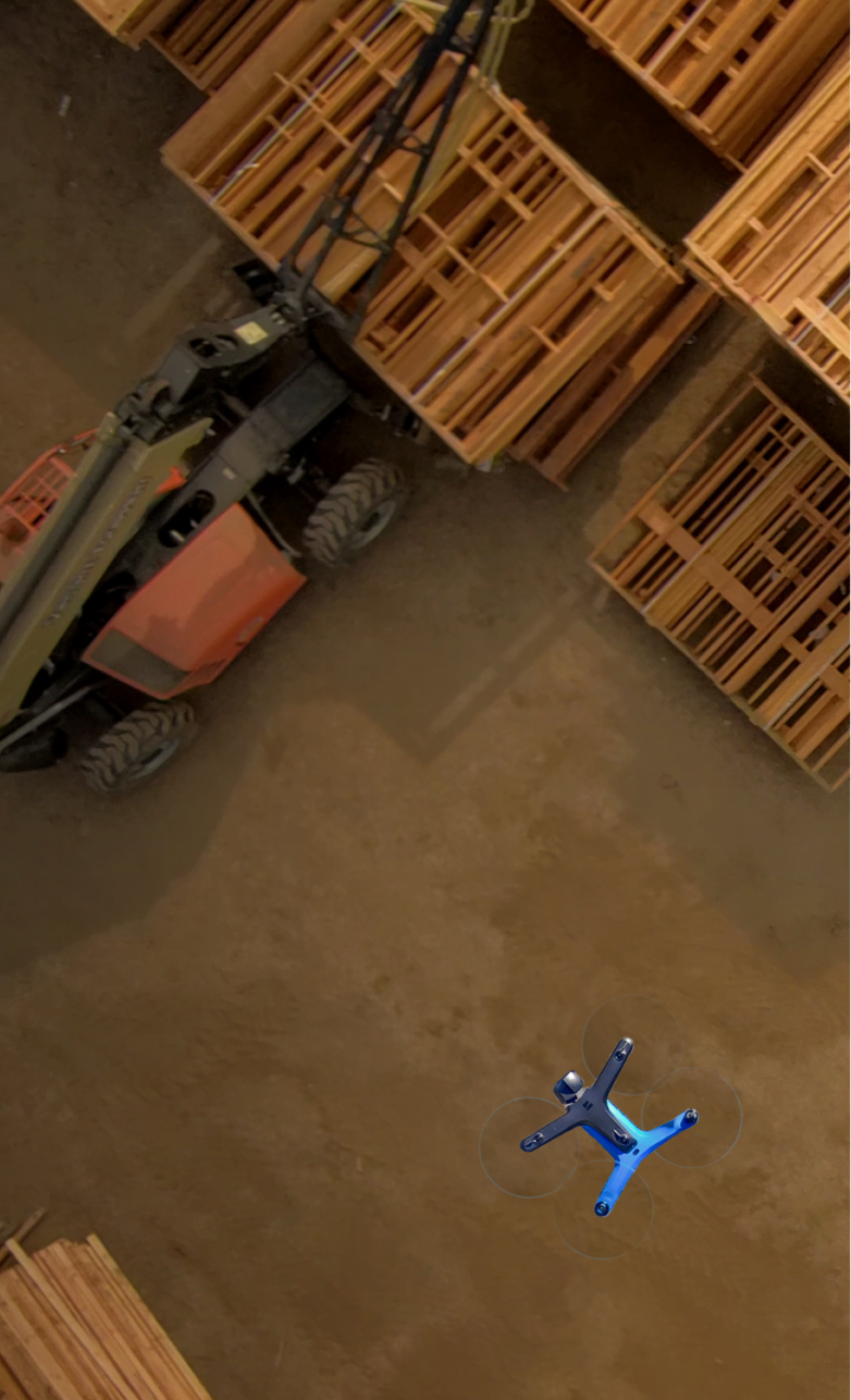 portrait view of Skydio drone in flight above construction site