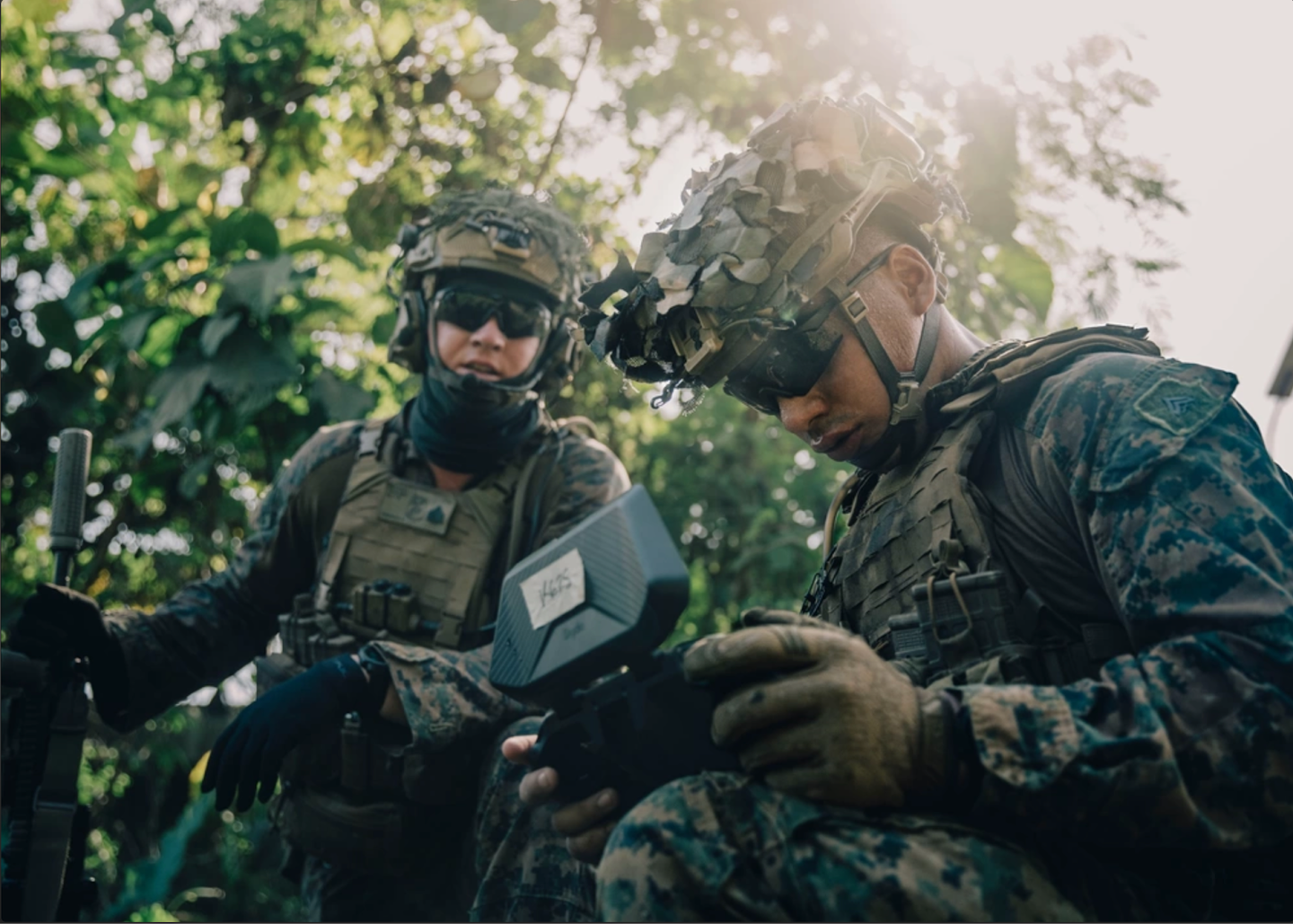 U.S. Marine Corps Sgt. Isaiah McCrary and Cpl. Samuel Bustamante conduct aerial reconnaissance with a Skydio X2D drone during Archipelagic Coastal Defense Continuum in Palawan, Philippines, May 21, 2024. (U.S. Marine Corps photo by Cpl. Joseph Helms)