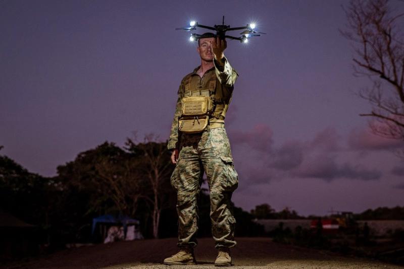 U.S. Marine Corps Cpl. Joshua Henneberg, a rifleman assigned to Alpha Company, Battalion Landing Team 1/5, 15th Marine Expeditionary Unit, prepares to launch a Skydio X2D small unmanned aerial system during integrated training alongside Philippine Marines during Exercise Balikatan 24 on Balabac Island, Philippines, April 26, 2024. BK 24 is an annual exercise between the Armed Forces of the Philippines and the U.S. military designed to strengthen bilateral interoperability, capabilities, trust, and cooperation built over decades of shared experiences. (U.S. Marine Corps photo by Lance Cpl. Peyton Kahle)