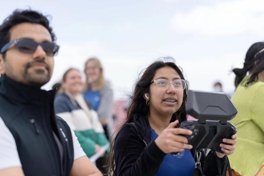 student flying with skydio enterprise controller