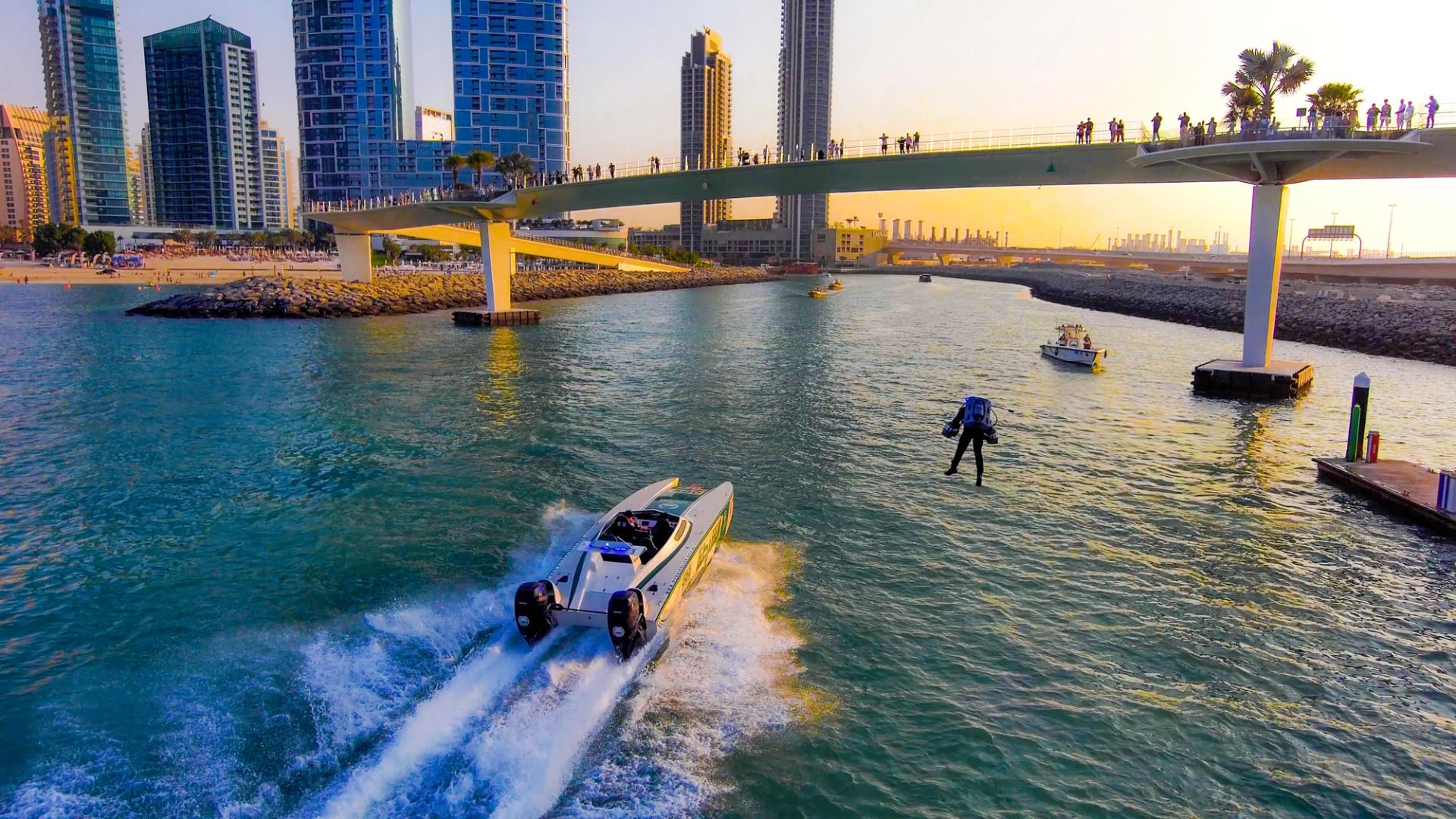 drone following Gravity jet suit demo in Dubai at sunset