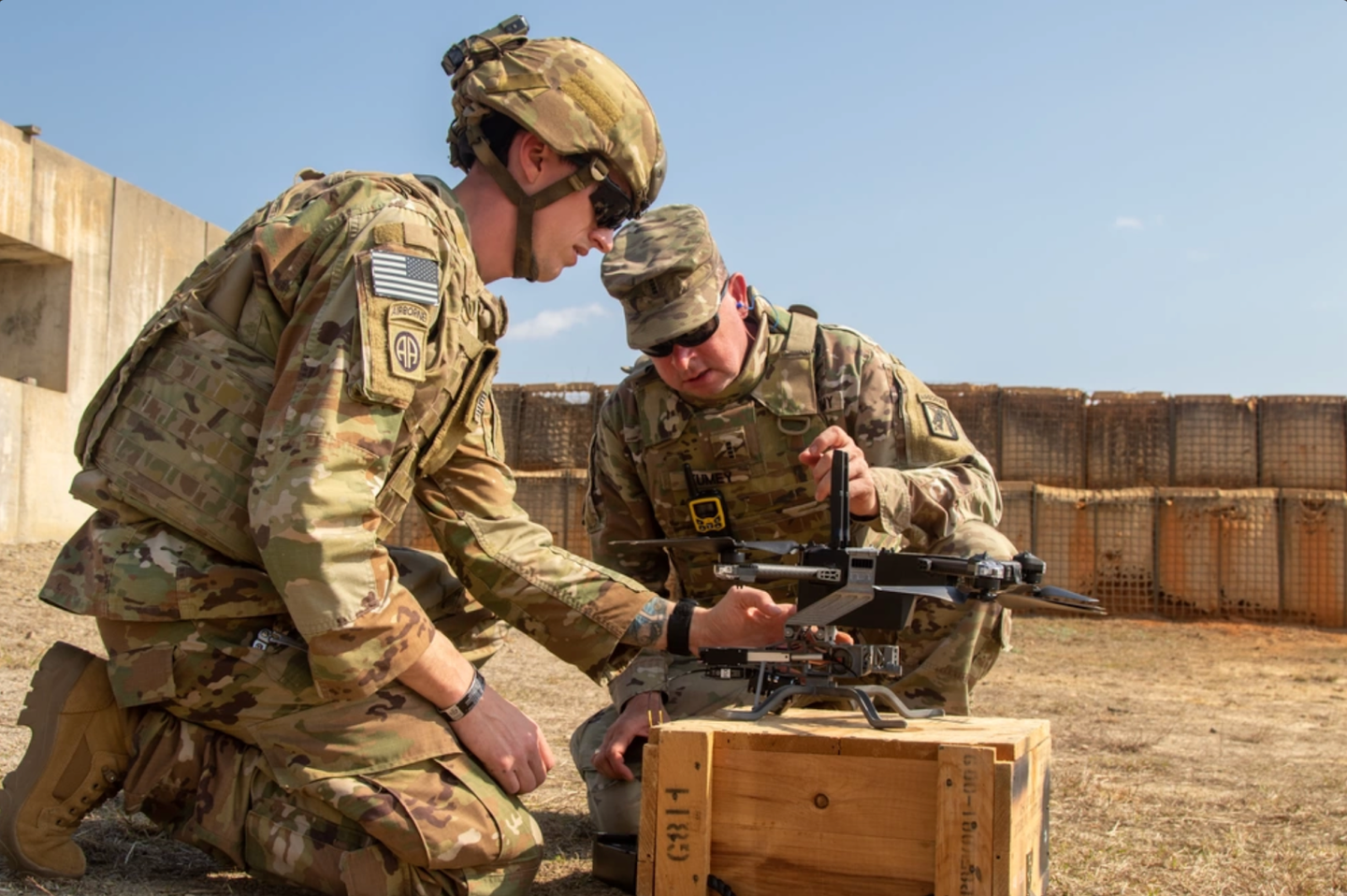 A U.S. Army soldier loads grenades onto a Skydio drone for an exercise at Fort Bragg, N.C., Feb. 23, 2023. This exercise tests a new chassis system developed by DEVCOM Armament Center. (U.S. Army photo by Spc. Casey Brumbach)