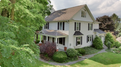 picture of house surrounded by trees