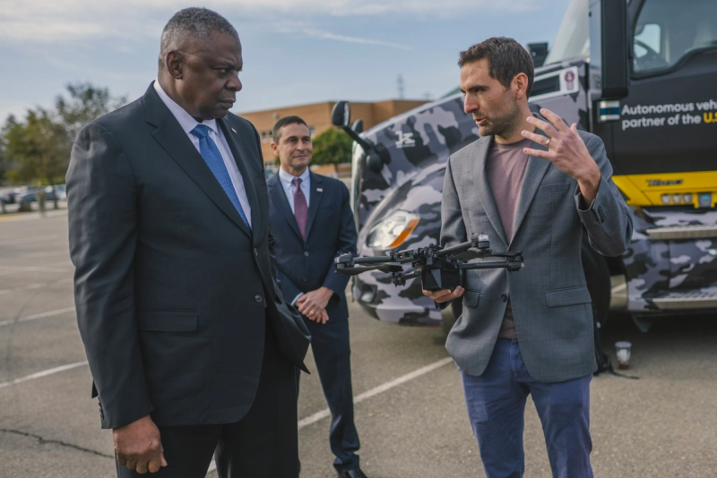 Skydio CEO and Co-founder, Adam Bry, demonstrates an X2D drone for Defense Secretary Lloyd Austin III.	 