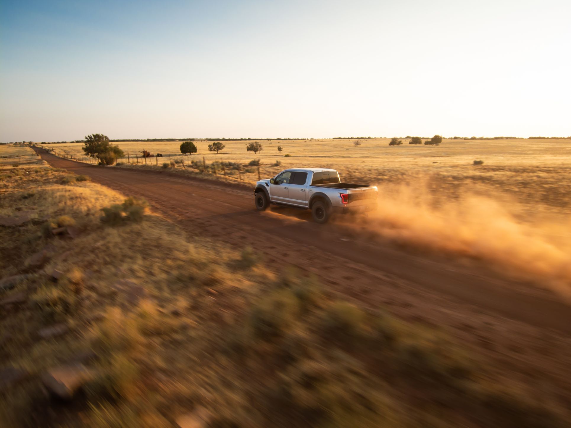 Slow shutter drone photo of f-150 offroad