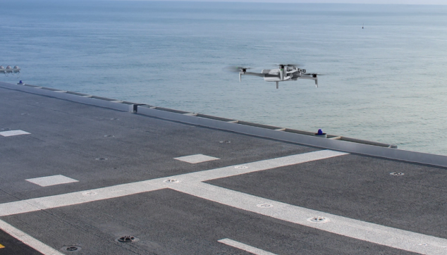 Skydio X10D drone inspecting landing strip on aircraft carrier