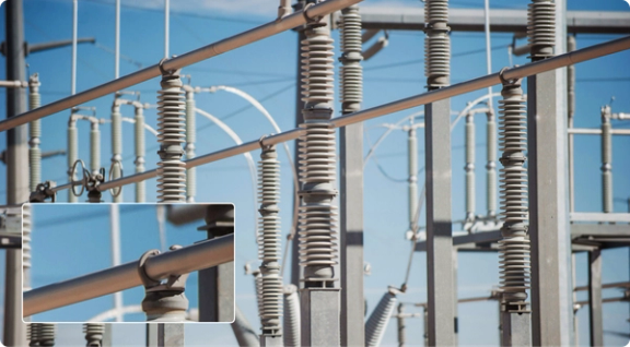 Picture in picture of Zoomed in detail of substation components and loose bolts