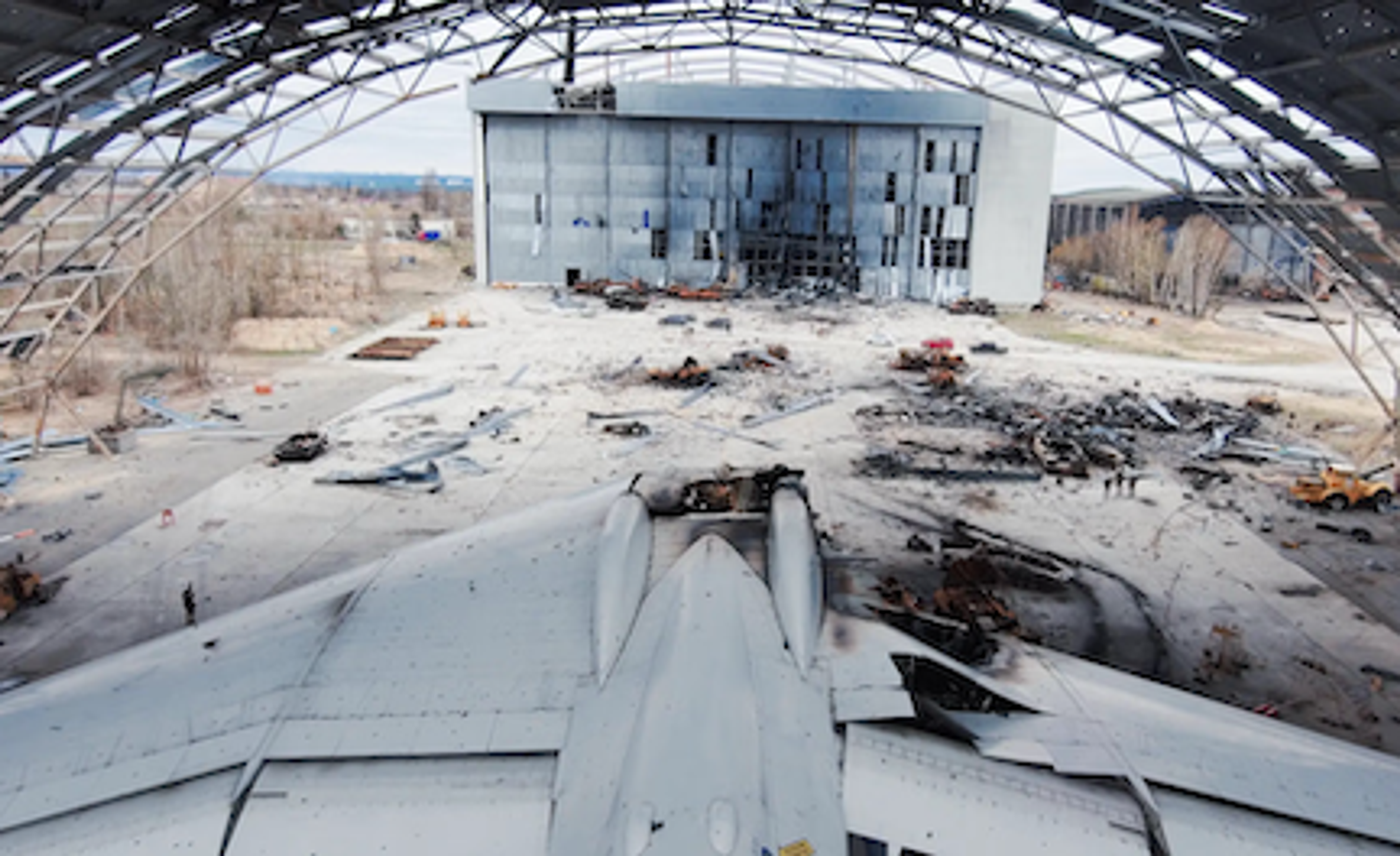 inside of bombed out airplane hanger