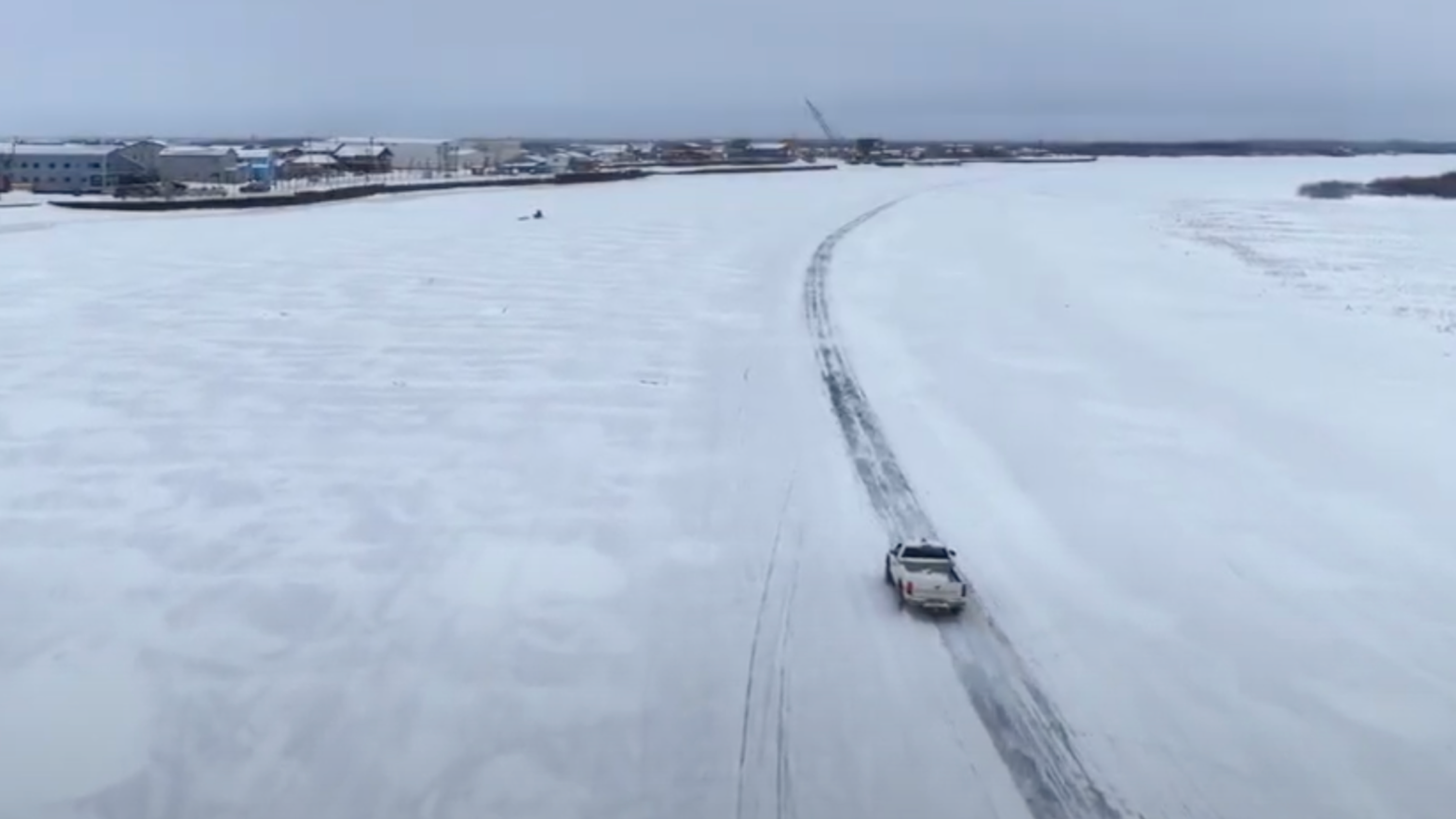 Using a Skydio X10 to monitor an ice road in Alaska while a vehicle travels on it