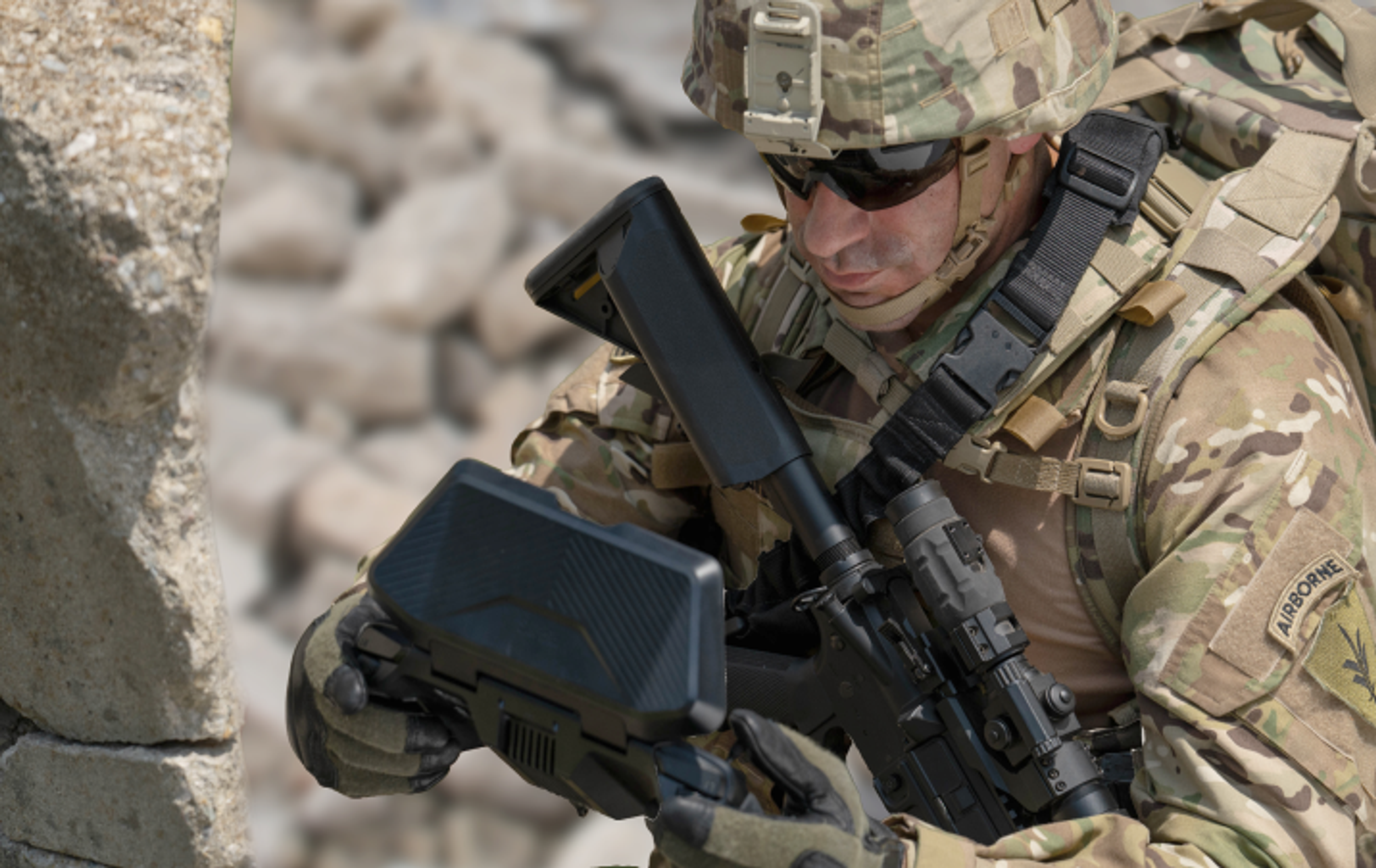 Soldier viewing squadron location on Skydio controller