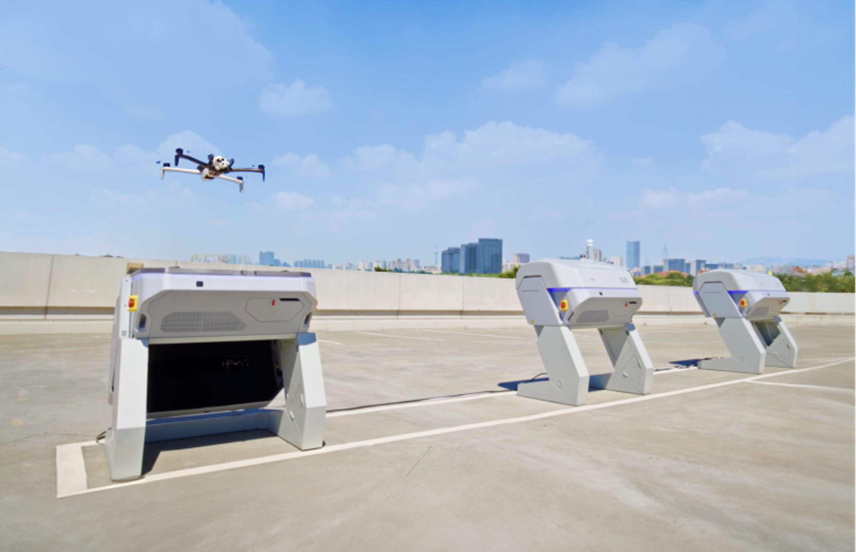 Mutliple Skydio docks lauching remote drones flights in mid sized city 