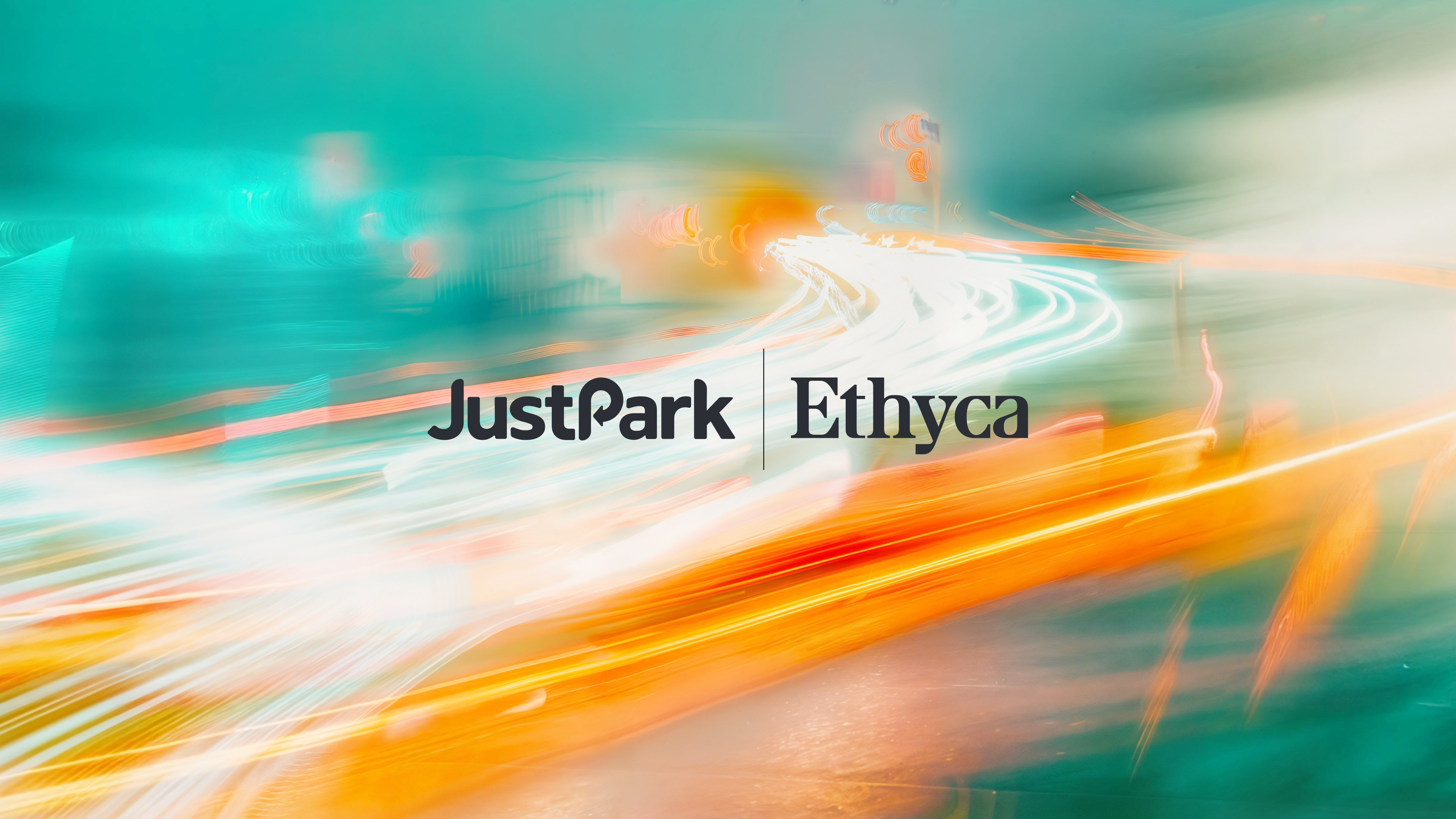 justpark and ethyca logos over abstract light trails in motion