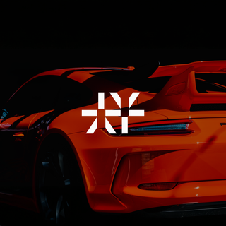 Bright red Porsche car with the Ethyca logo in white on top of the photo.