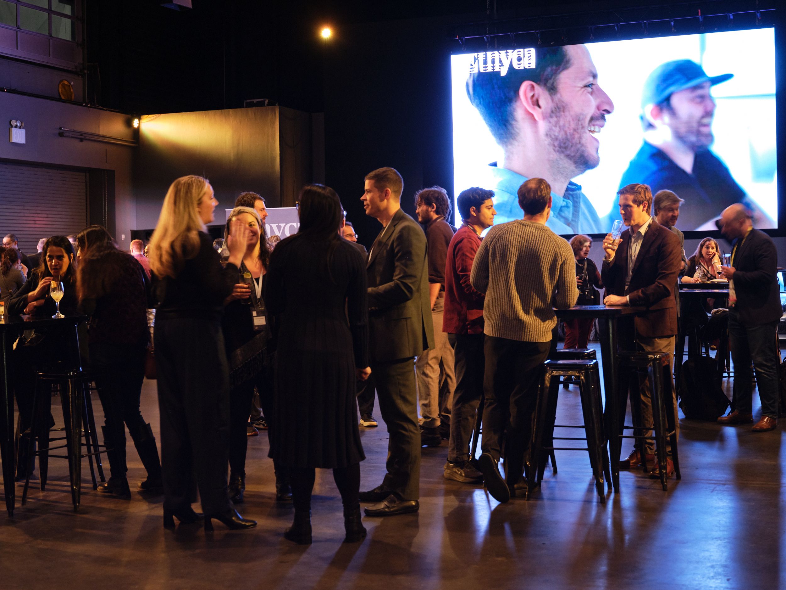 A lanyard card with "Ethyca" written on it being worn by an event attendee.