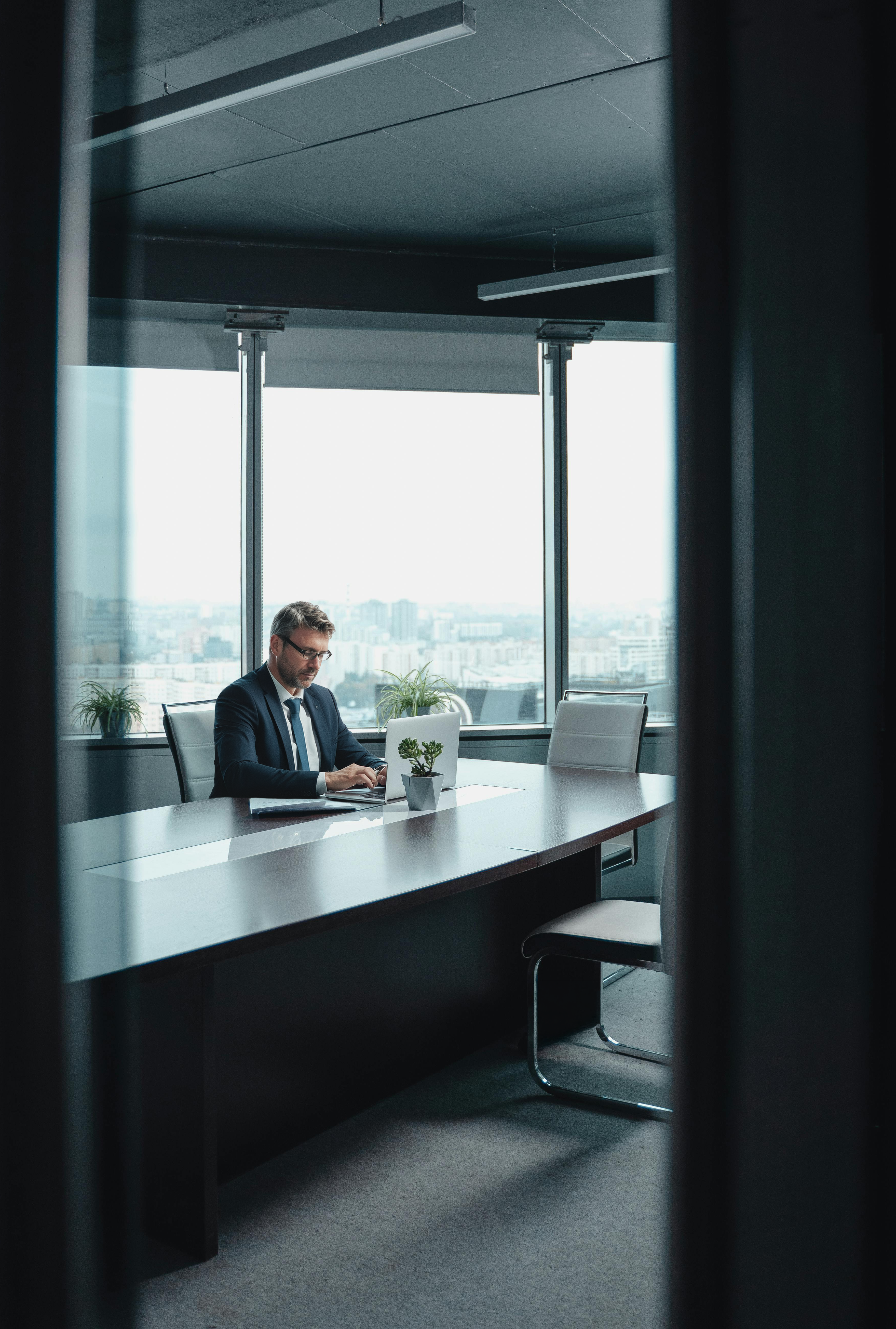 ceo-office-using-a-laptop