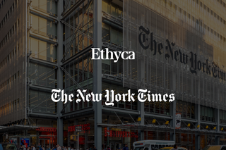 New York Times and Ethyca logos over a photo of the New York Times building and street scene