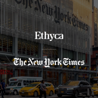 New York Times and Ethyca logos over a photo of the New York Times building and street scene