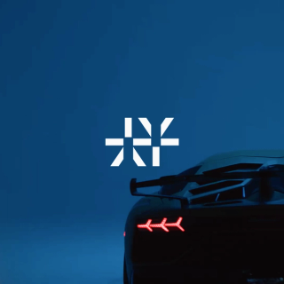 Rear end of a super car with the Ethyca logo in white on top of the photo.