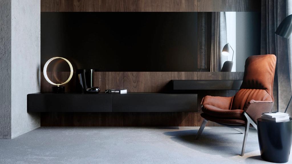 Interior with a wooden wall panel, a black floating cabinet and a terracotta leather armchair
