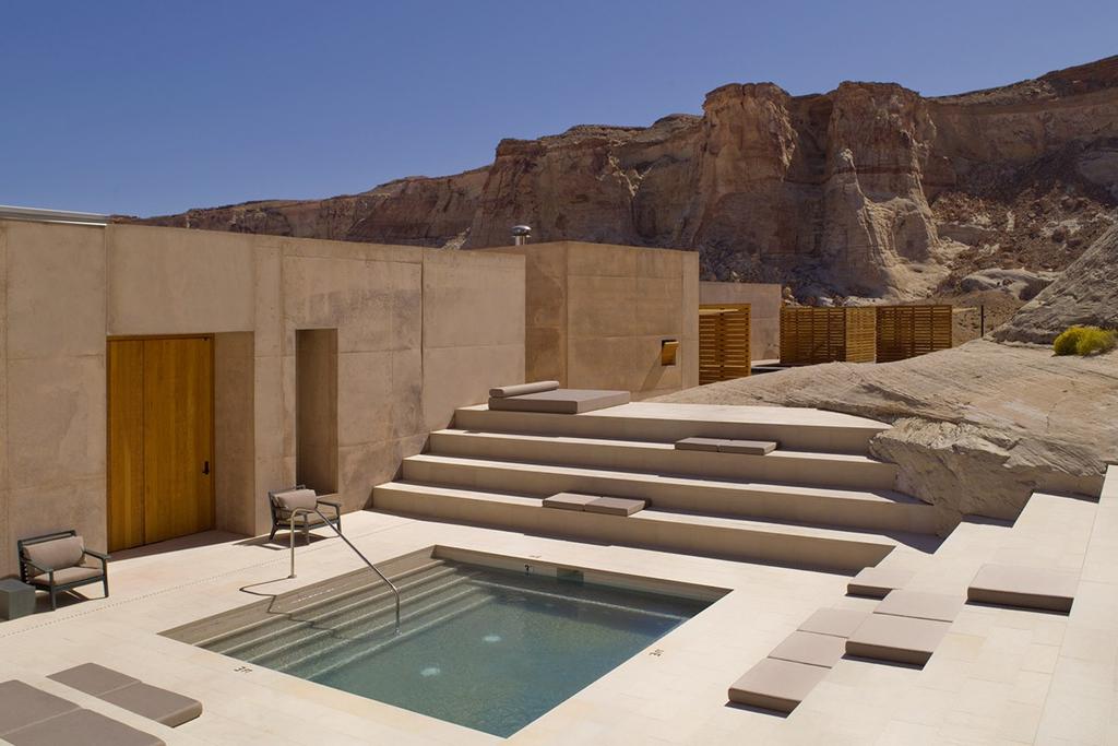The outdoor pool and terraced deck at Amangiri, set against the red rocks of the Utah desert