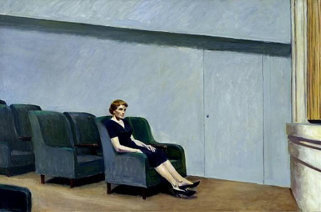 Hopper's Intermission: a woman sitting alone in a green seat in an empty theatre auditorium