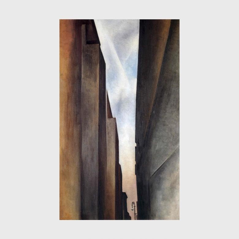 O'Keeffe painting: a narrow sliver of sky between the grey-brown buildings of a street