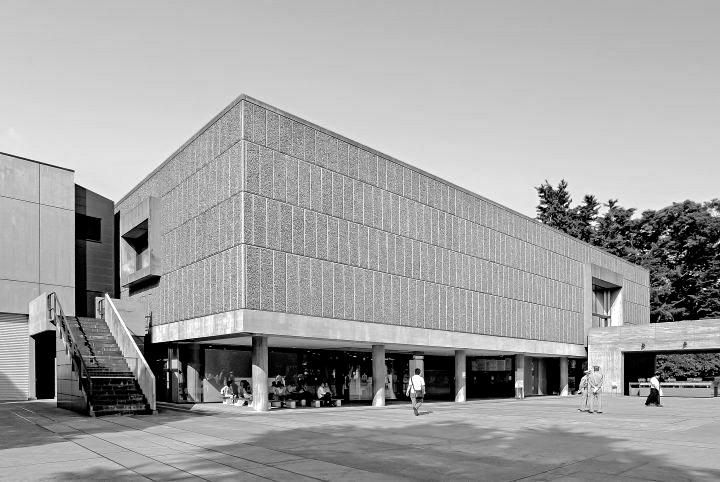 Black-and-white view of the façade of the National Museum of Western Art in Tokyo, showing the building raised on pilotis